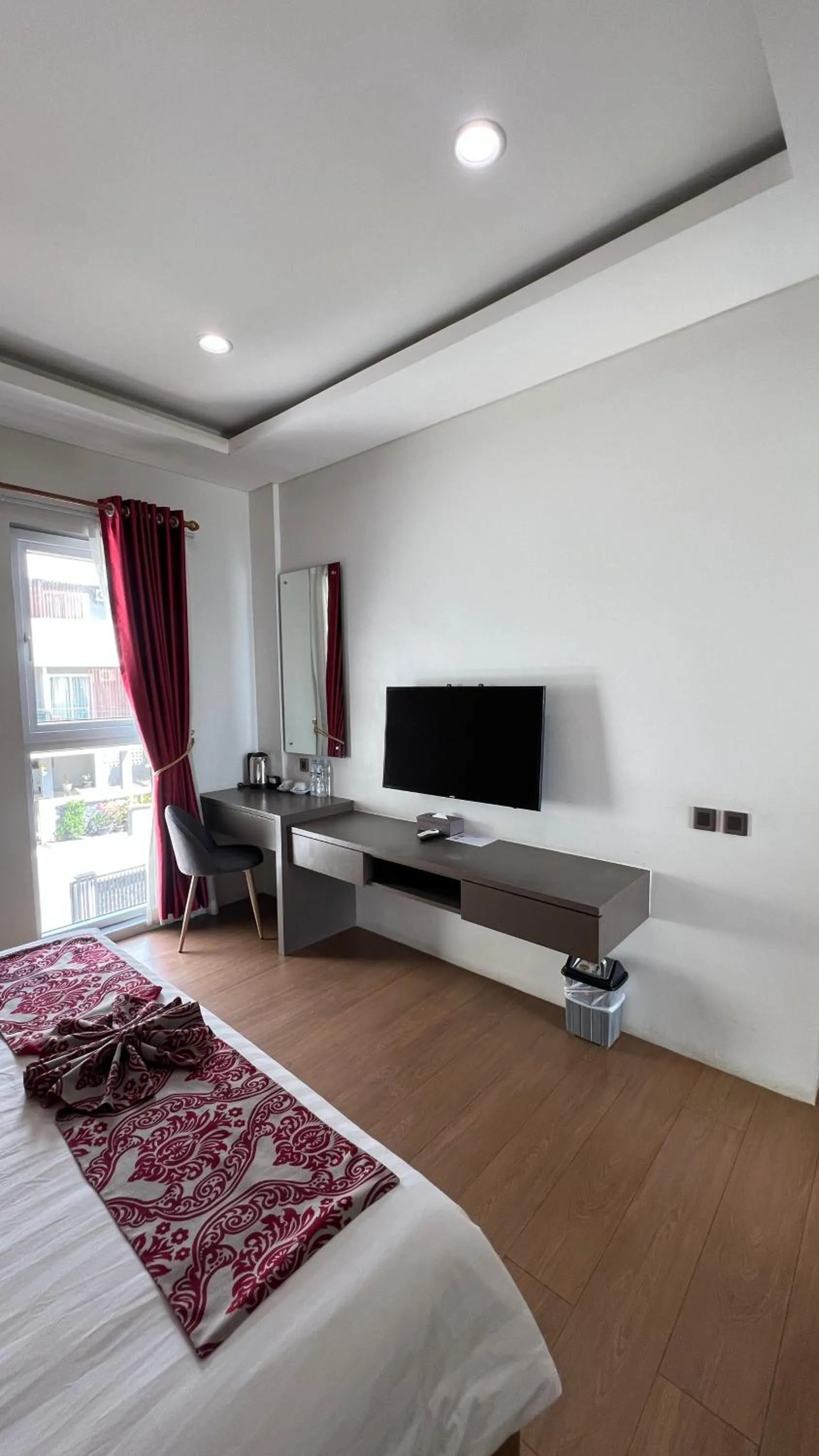 Bed in PURNAMA BALIGE HOTEL