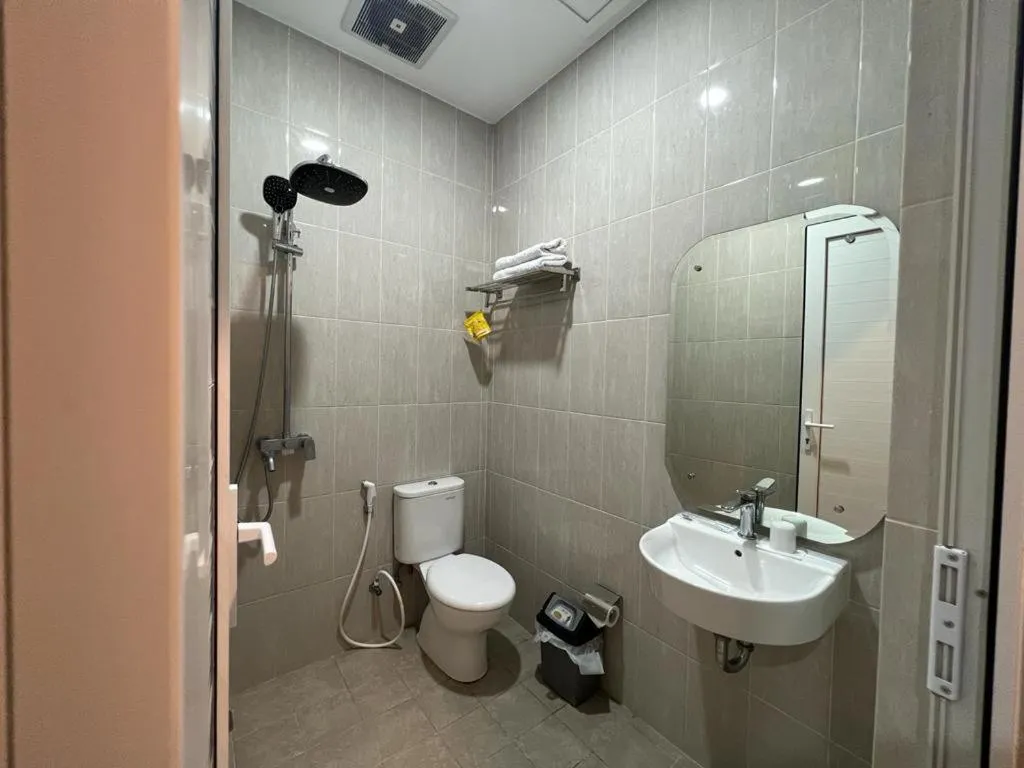 Bathroom in PURNAMA BALIGE HOTEL