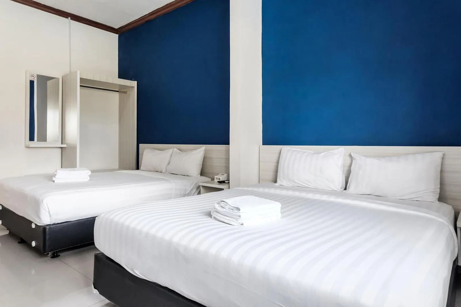 Bedroom, Bed in TwoSpaces Living at Panorama Villas