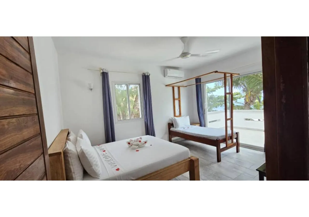 Bed in Sipano Beach Lodge Kiwengwa