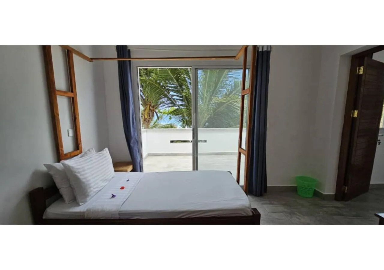 Bed in Sipano Beach Lodge Kiwengwa