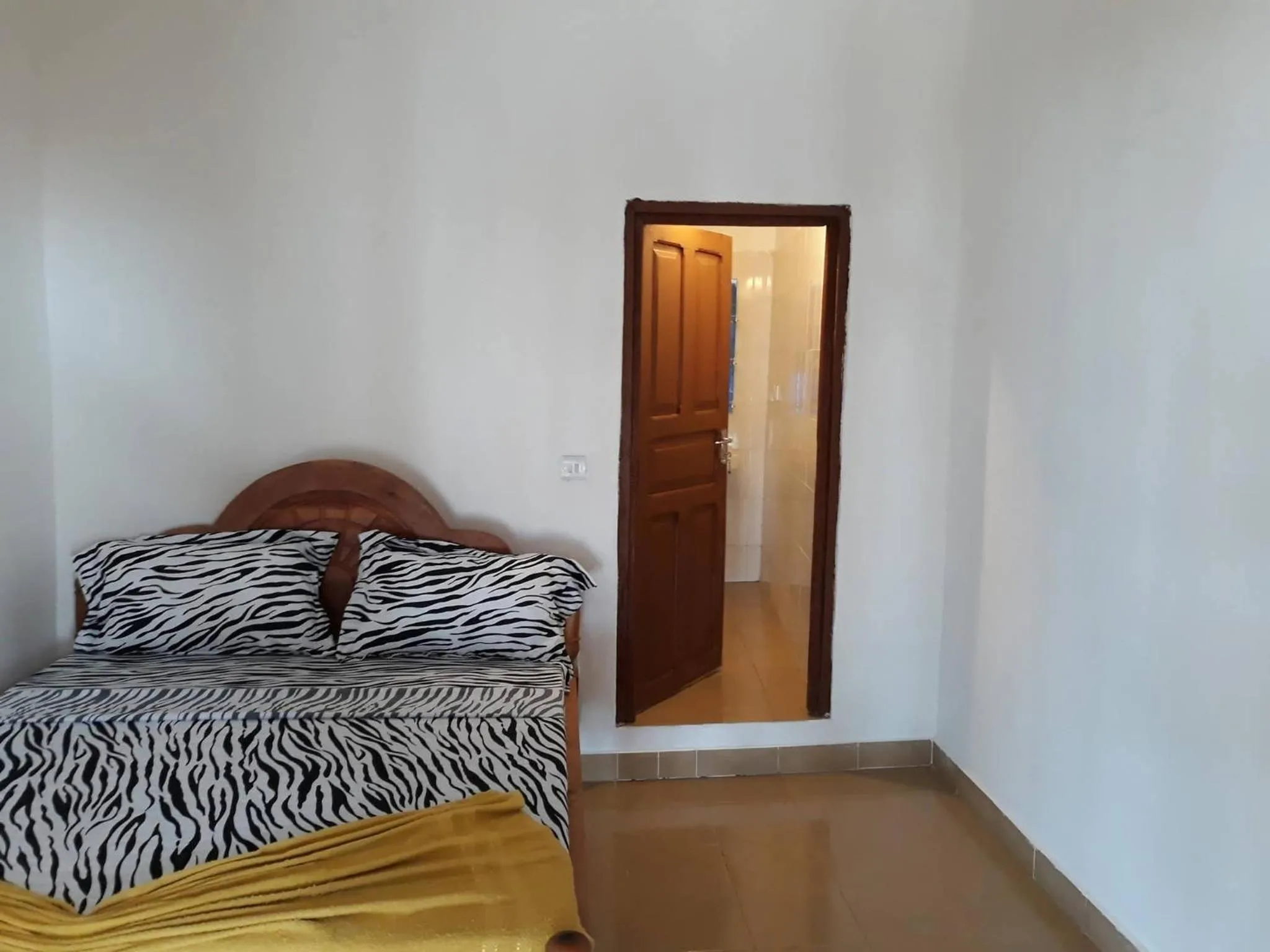 Bed in Sipano Beach Lodge Kiwengwa