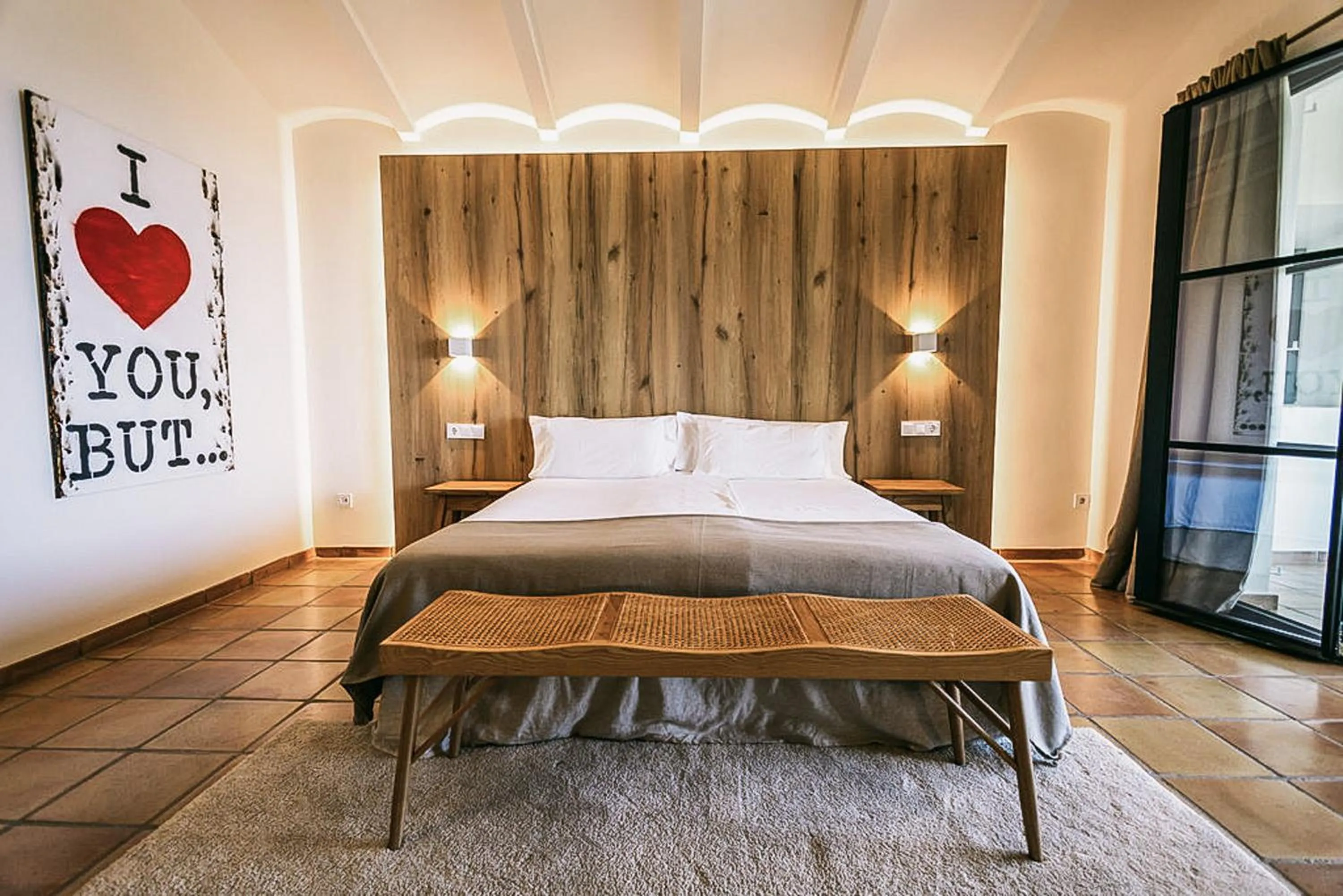 Bed in Posada del Marqués I A Slow Design Hotel