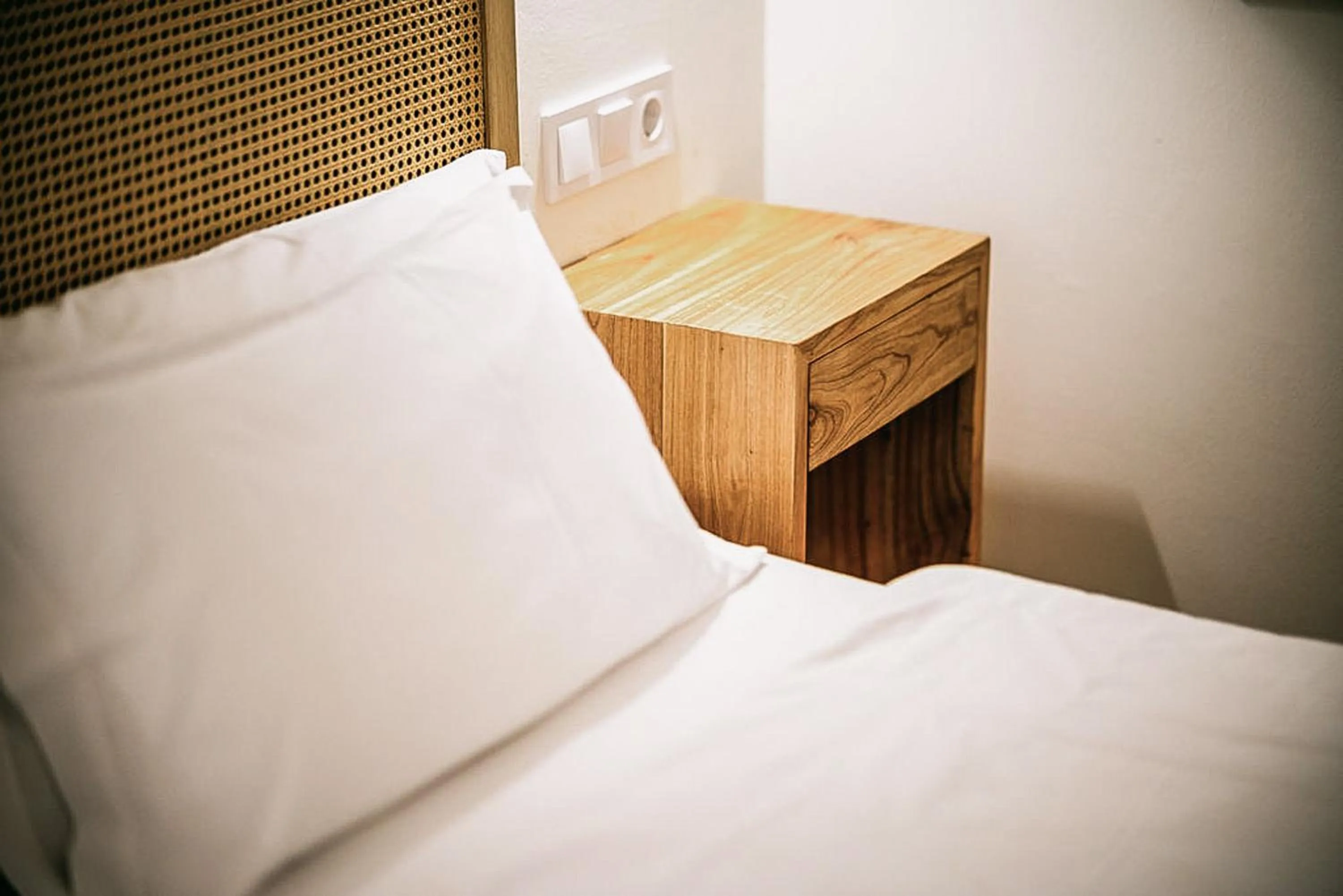 Bed in Posada del Marqués I A Slow Design Hotel