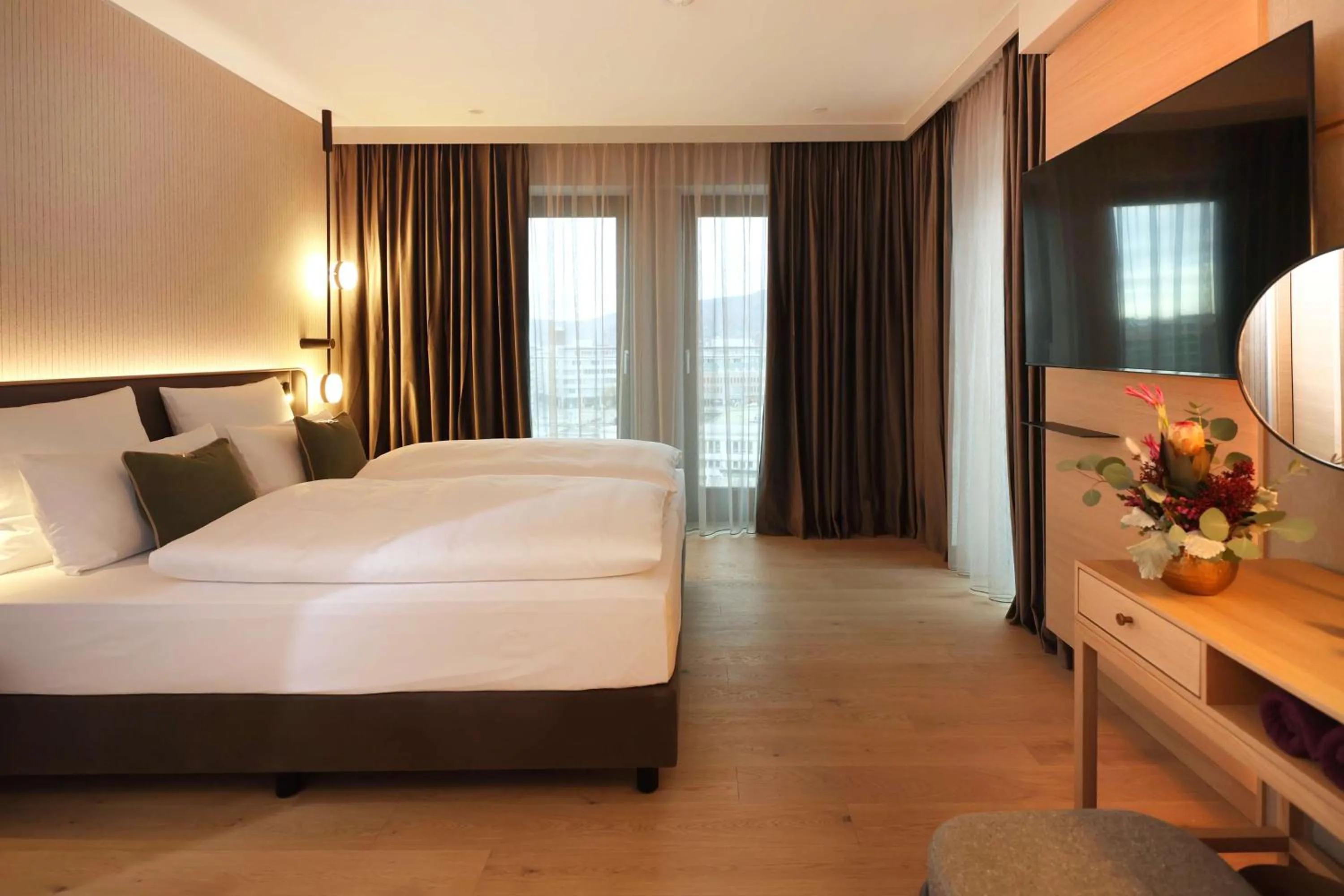 Photo of the whole room, Bed in ATLANTIC Hotel Heidelberg