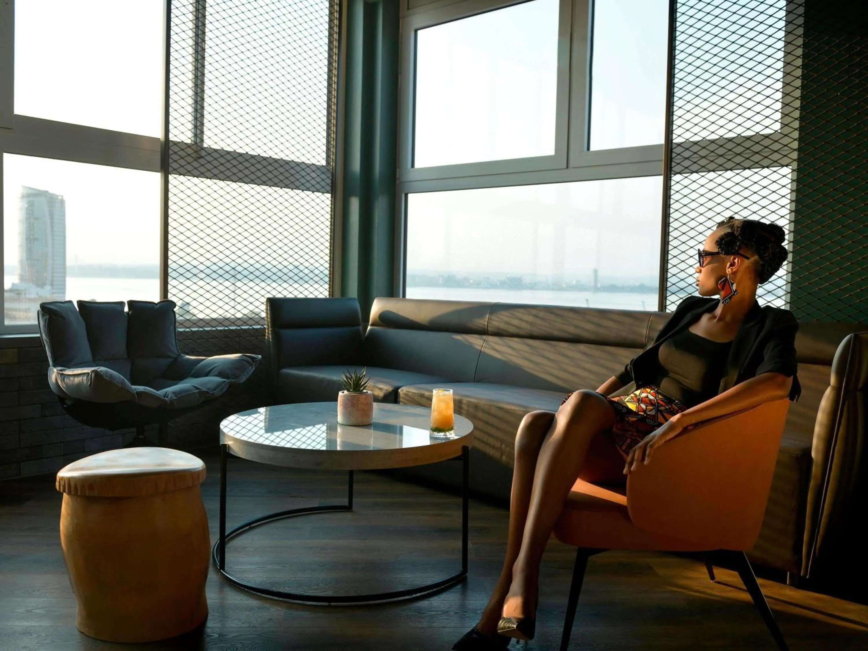Lounge or bar in Novotel Kinshasa La Gombe