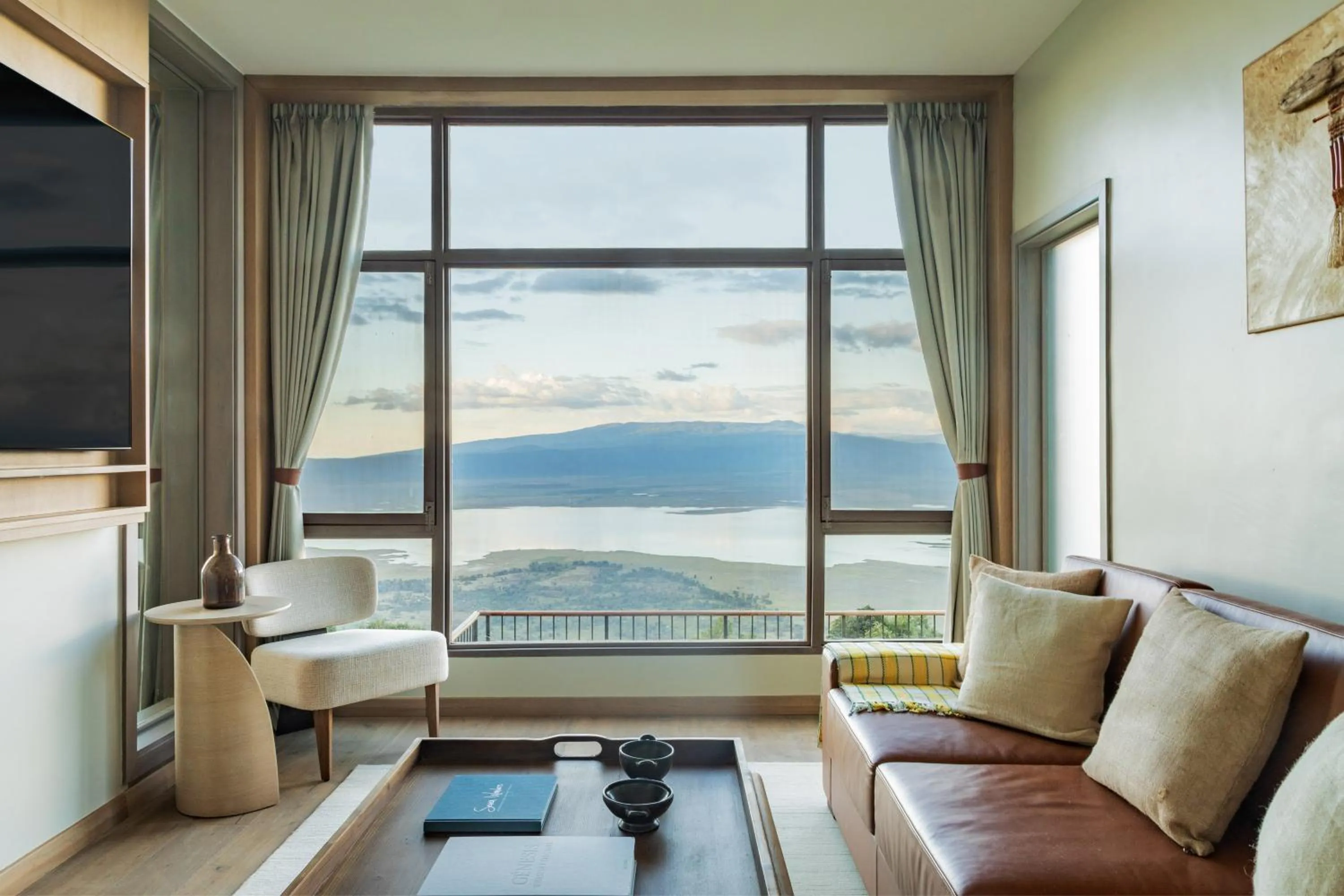 Communal lounge/ TV room in Ngorongoro Lodge member of Melia Collection - The Leading Hotels of the World