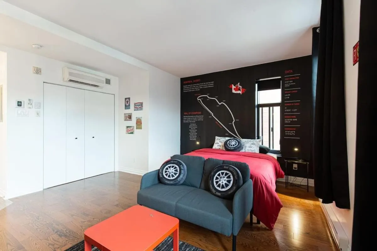 Bed in The Grand Prix Suite In the heart of MTL - M11 Rentals