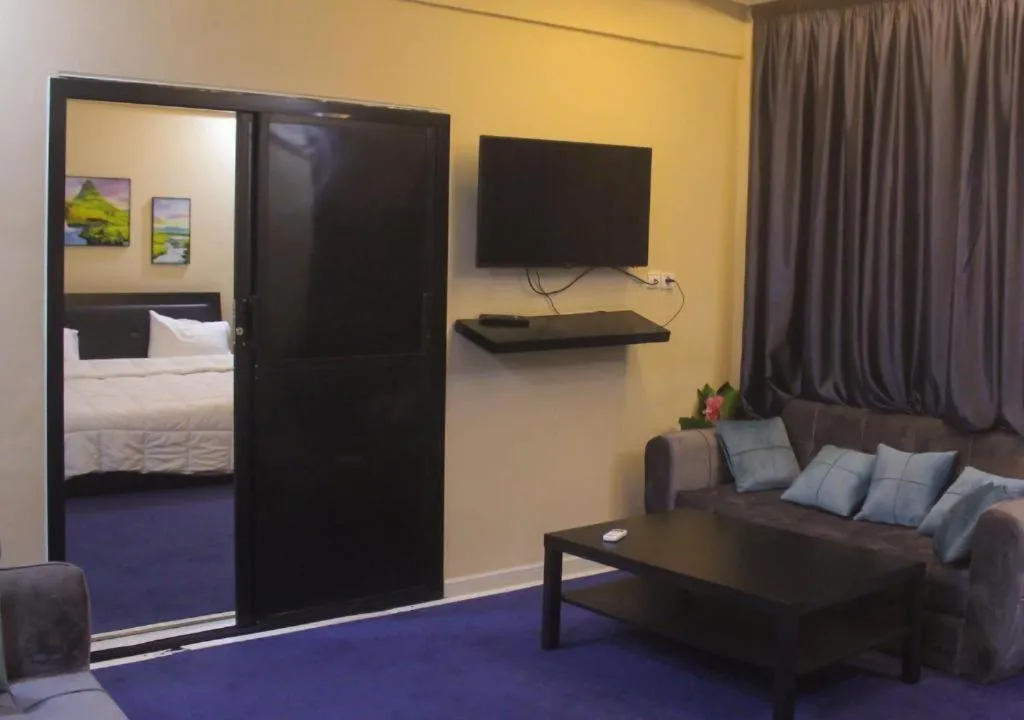 Communal lounge/ TV room in Andalusia Hotel