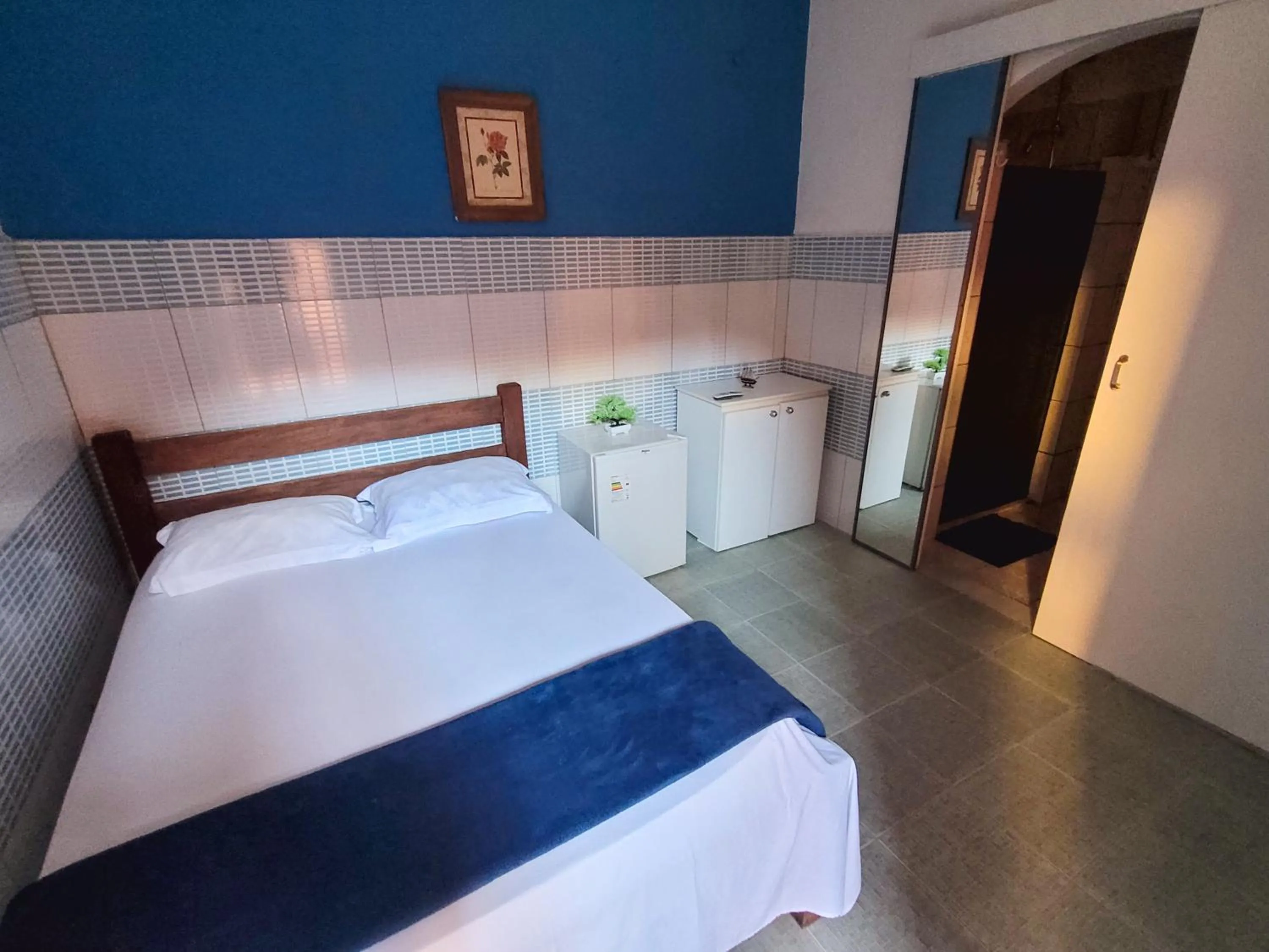 Bed in Pousada Villa Coelho