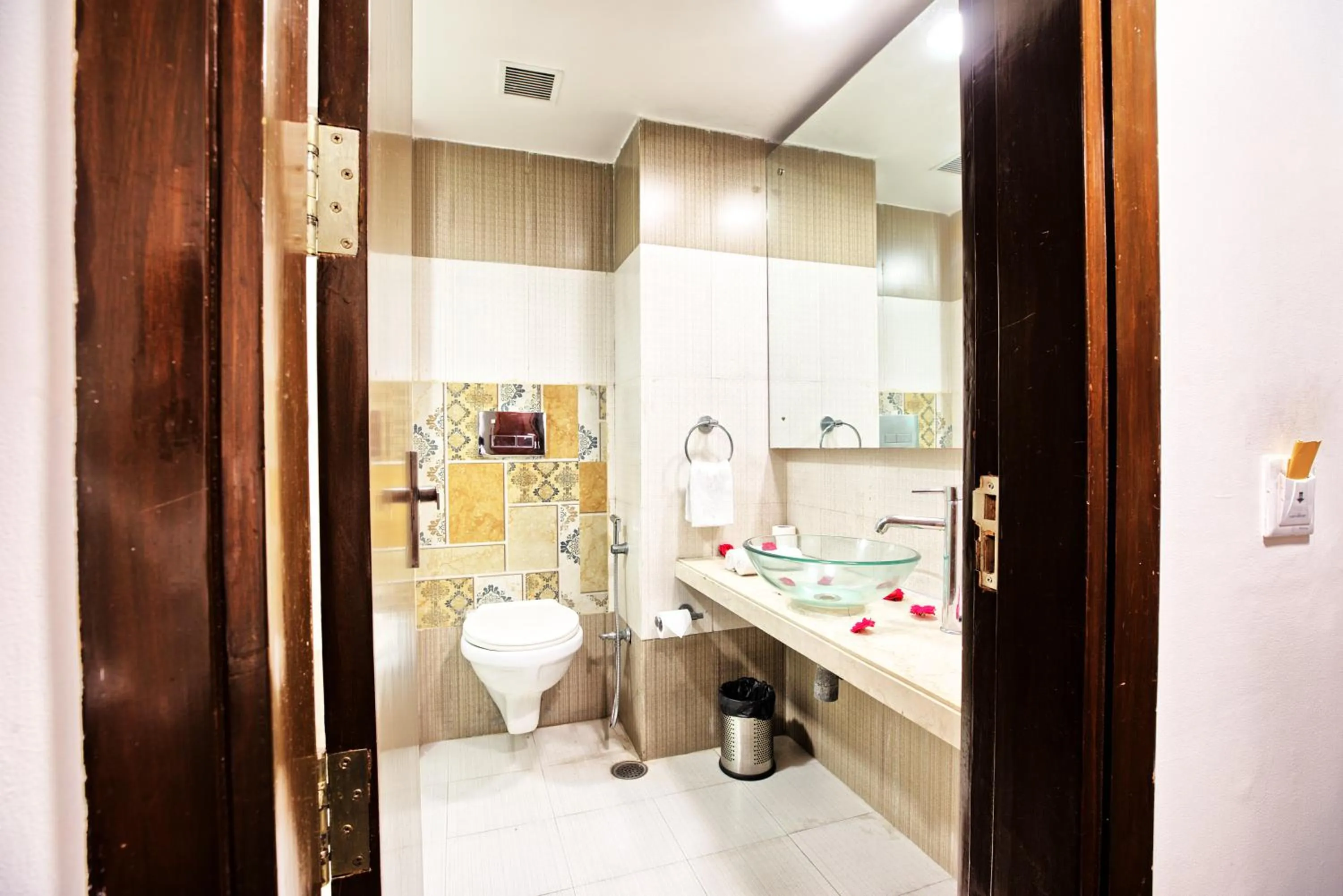 Bathroom in Rosemallow Hotel New Delhi