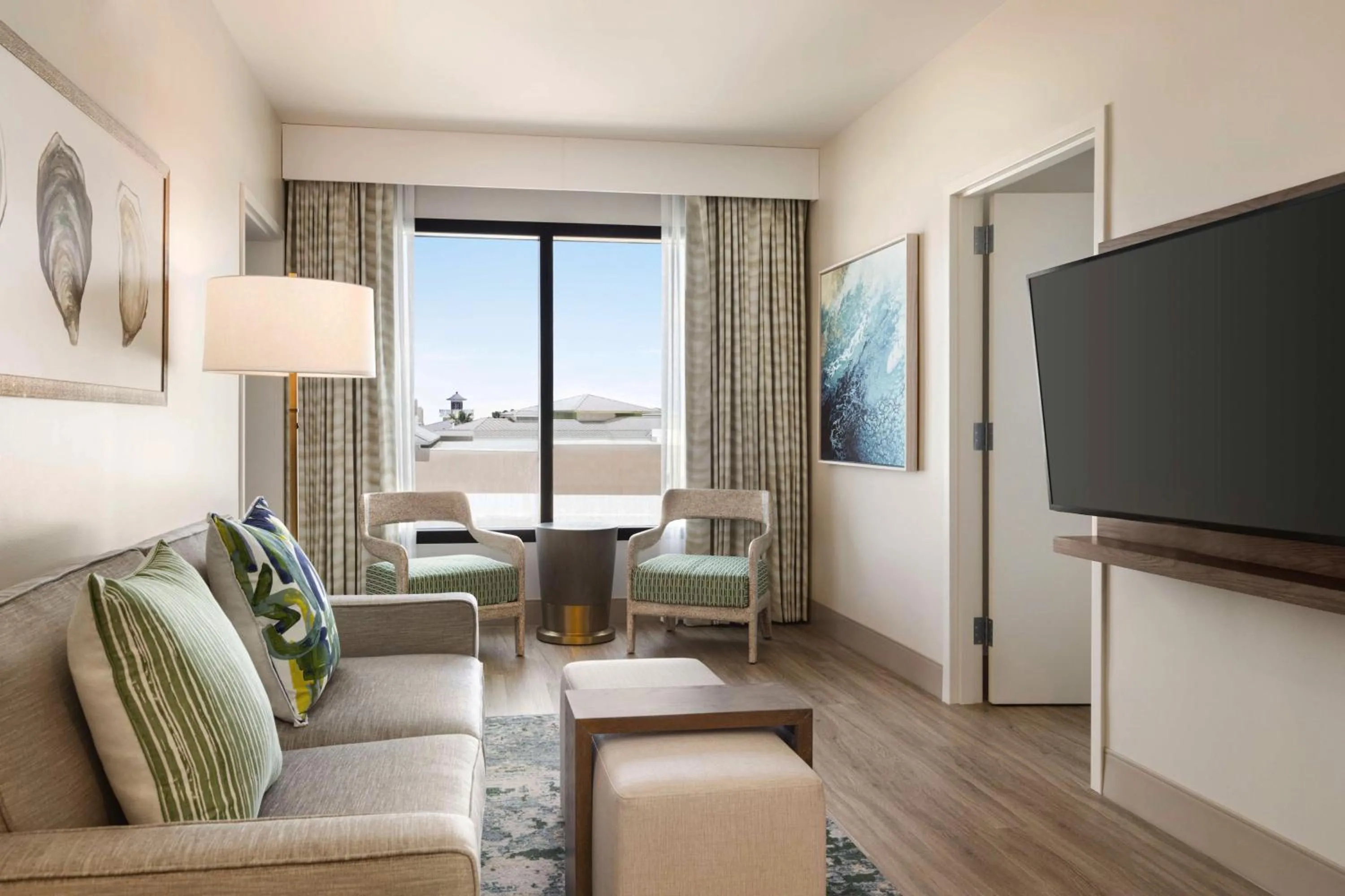 Living room in Embassy Suites By Hilton Panama City Beach Resort