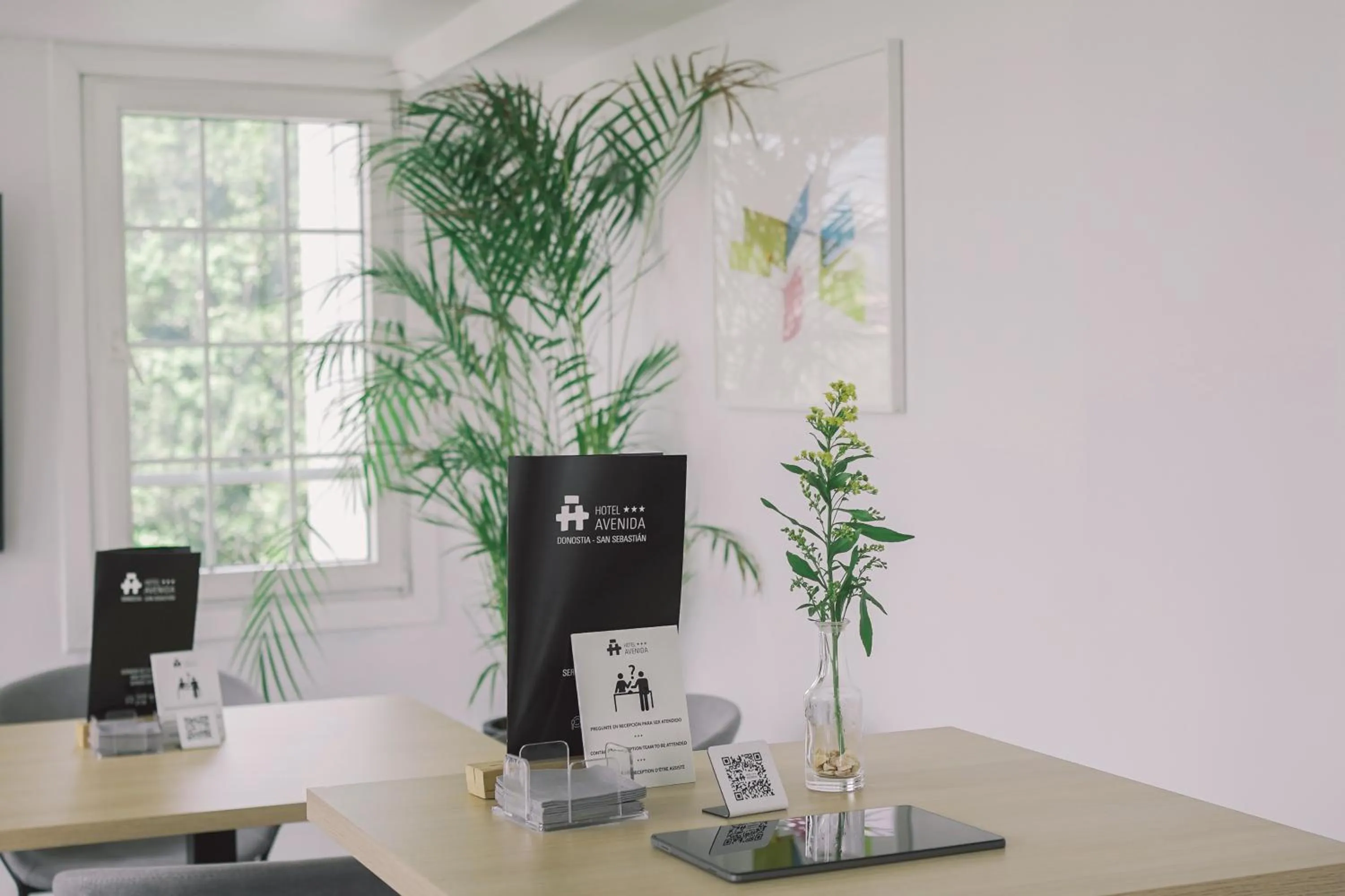 Communal lounge/ TV room in Hotel Avenida