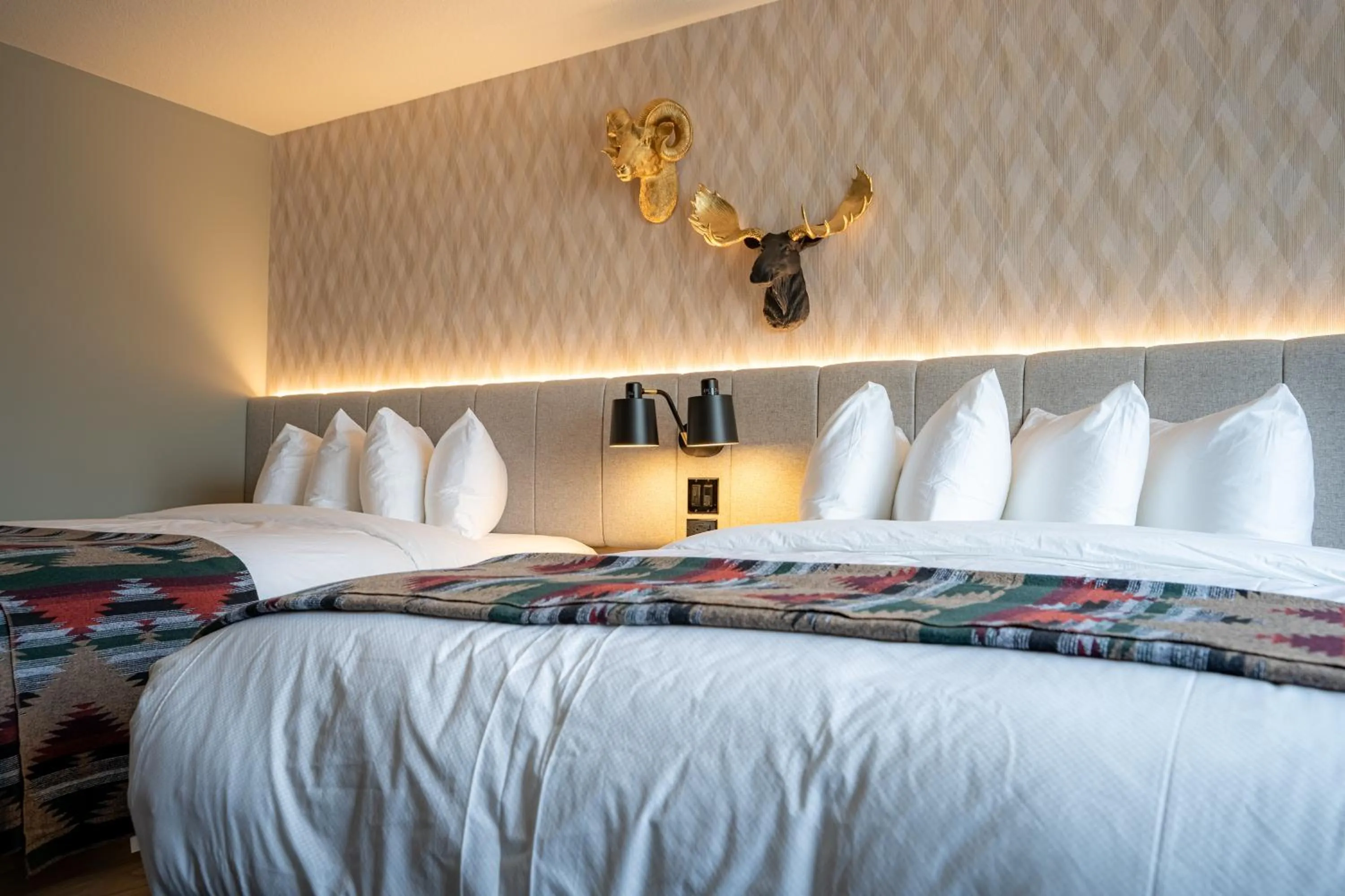 Bed in Everwild Canmore Hotel