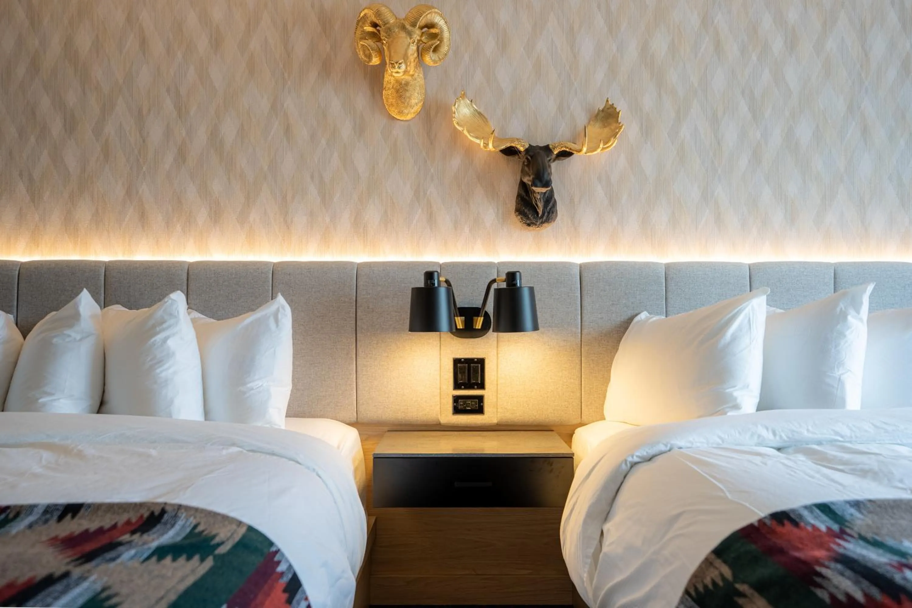 Bed in Everwild Canmore Hotel