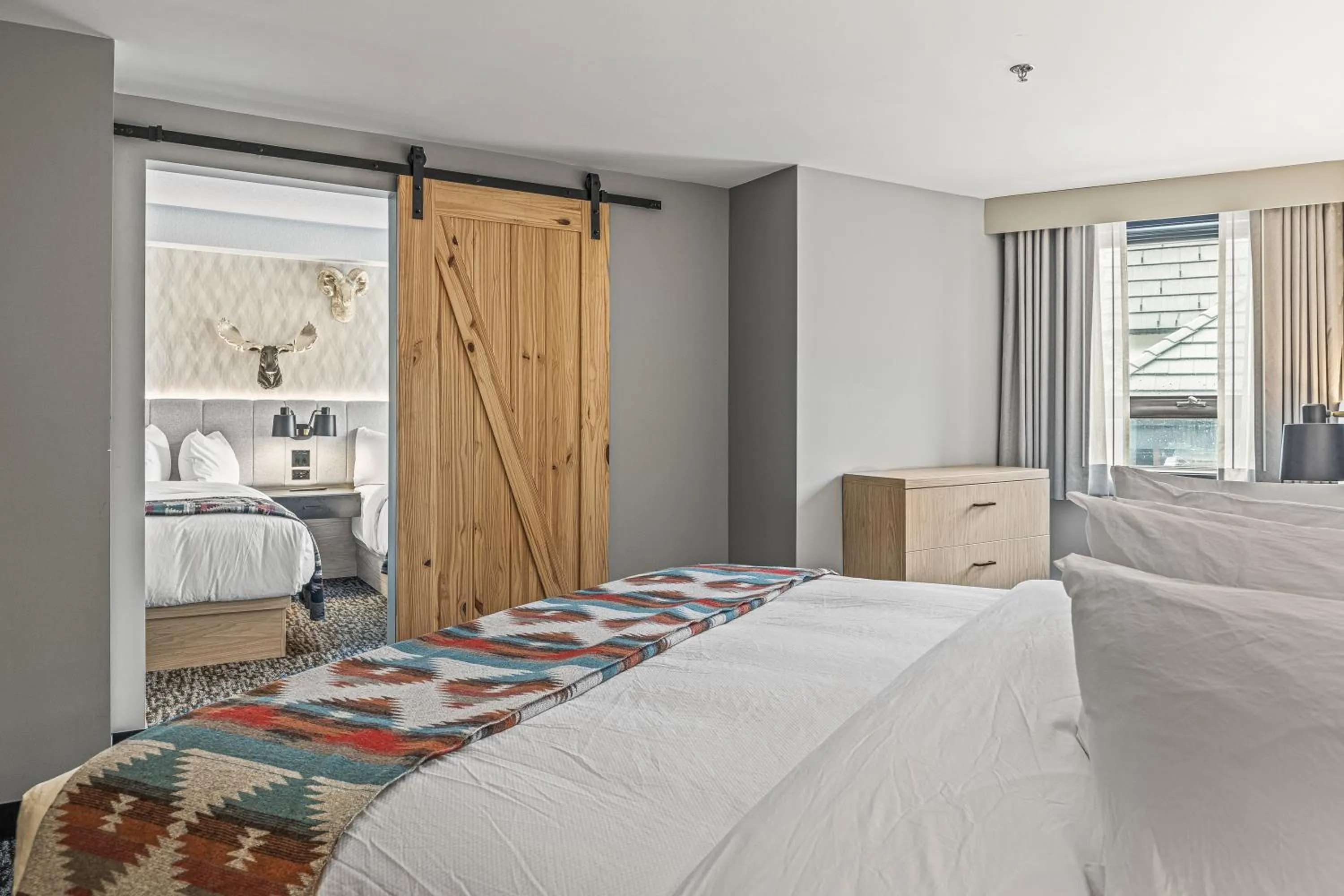 Bed in Everwild Canmore Hotel