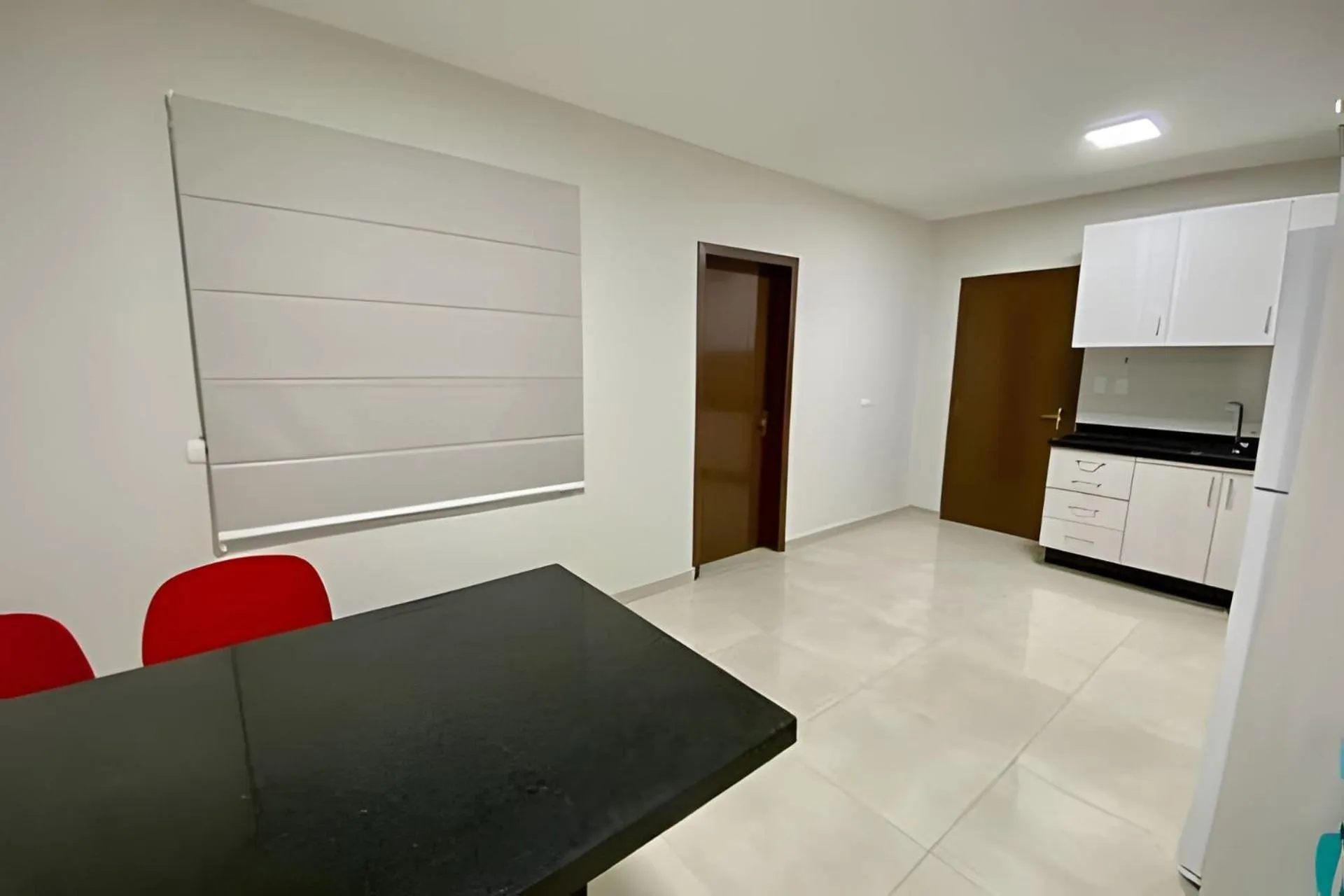 Kitchen or kitchenette, Bed in Edifício Shalfa