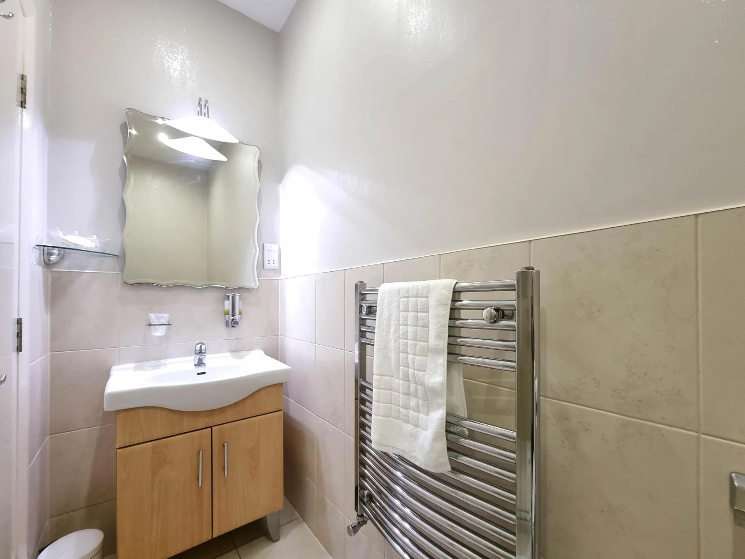 Bathroom in The Beach House, Luxury Apartments