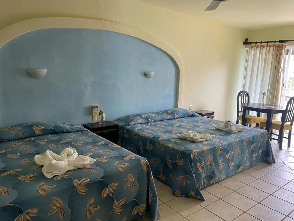 Photo of the whole room, Bed in Hotel Castillo Del Mar - 5 Th Ave