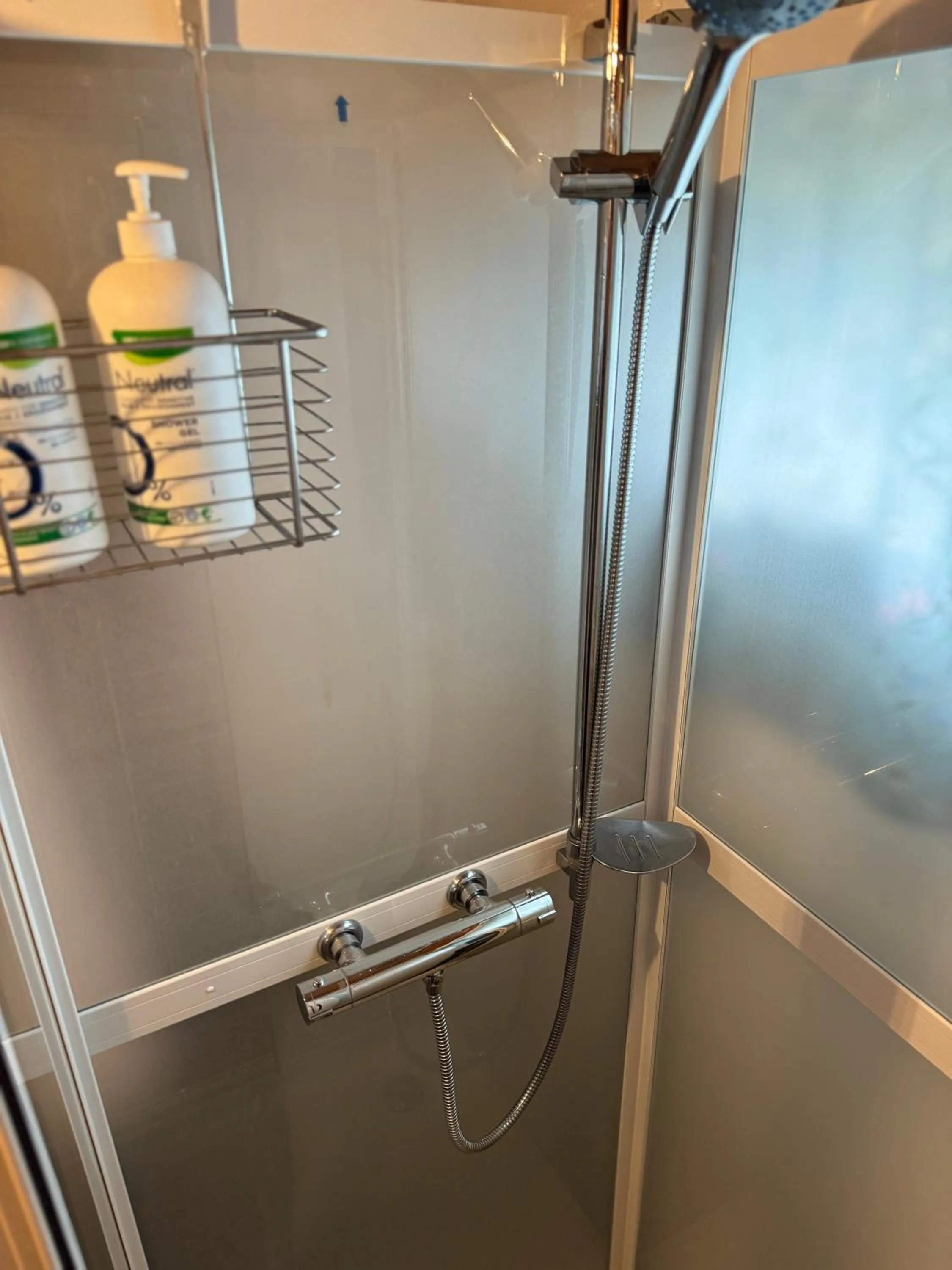 Shower in Just Like Home Bed & Spa - free private parking