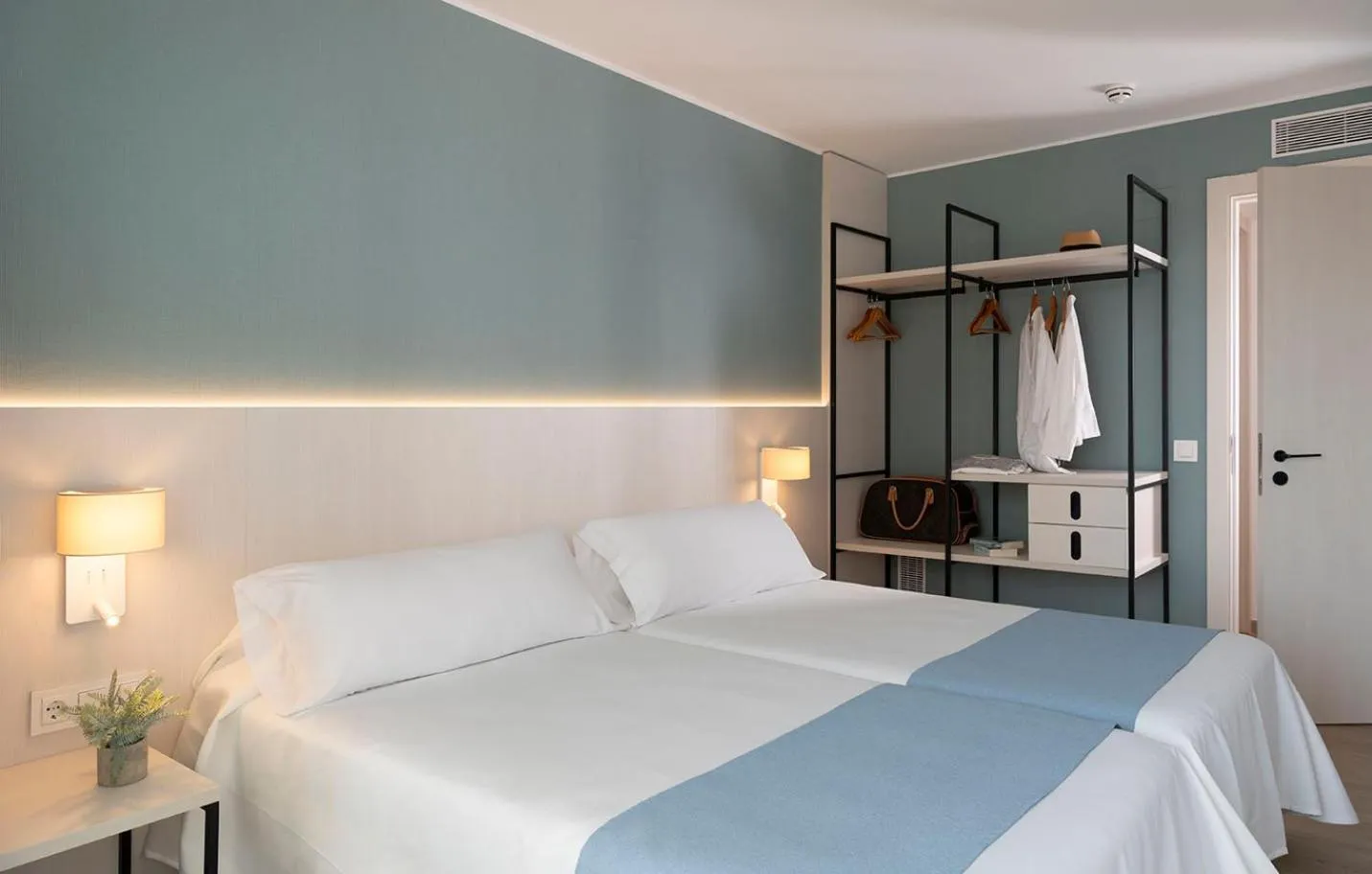 Bed in Costa Encantada Resort & Suites