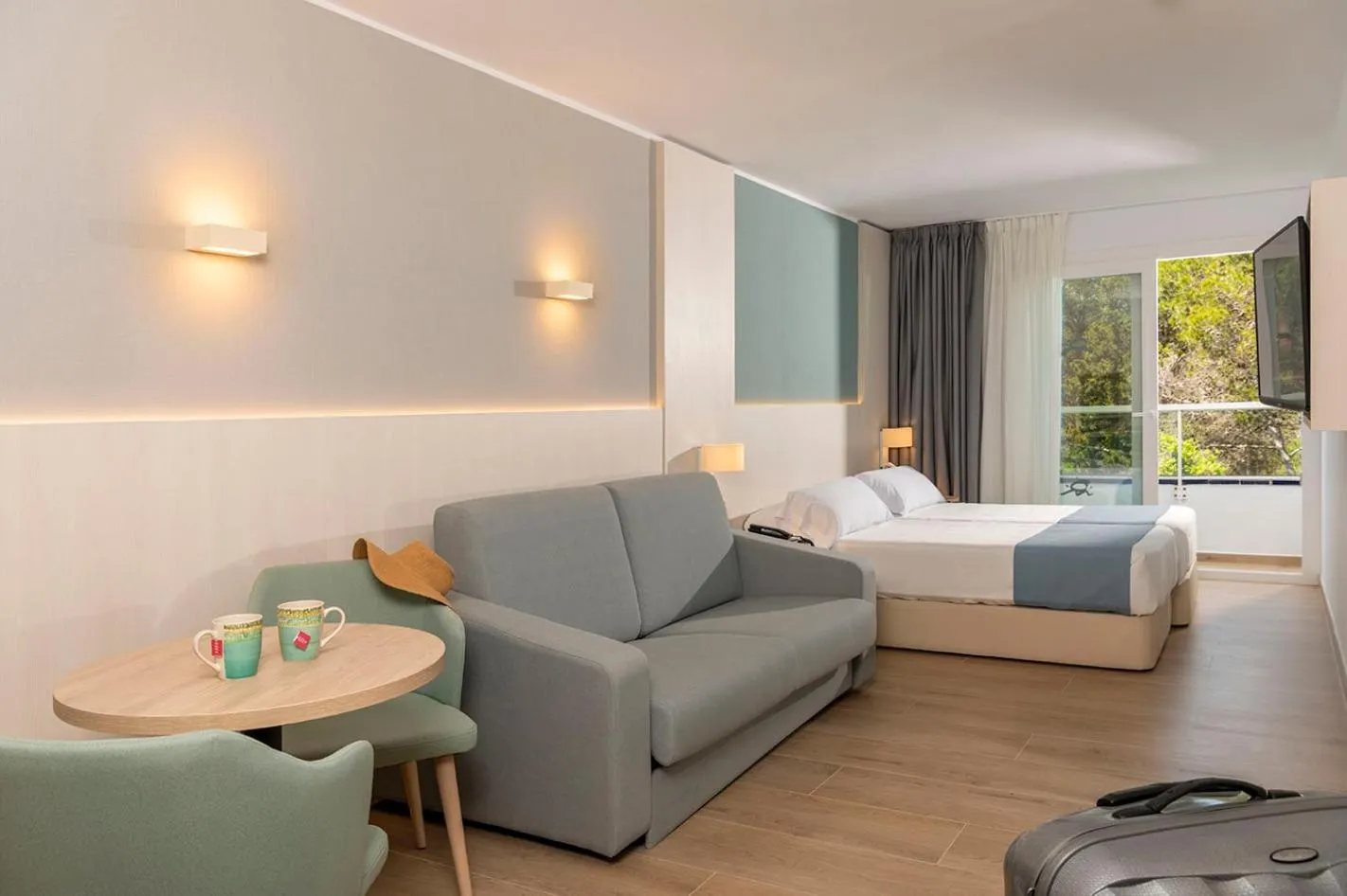 Bed in Costa Encantada Resort & Suites