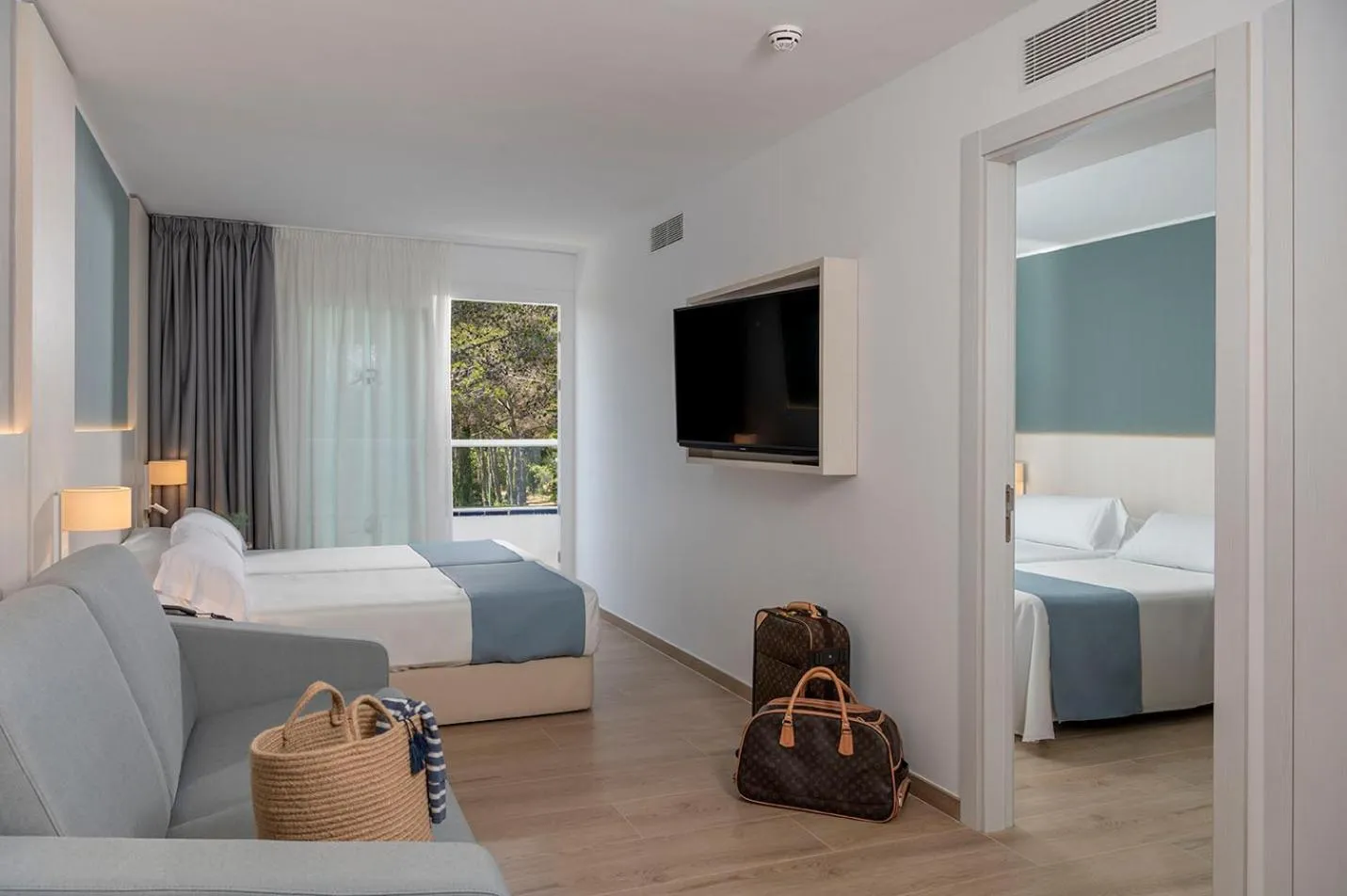 Bed in Costa Encantada Resort & Suites