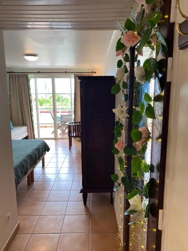 Bed in Studio Tropical avec vue mer dans une résidence hôtelière