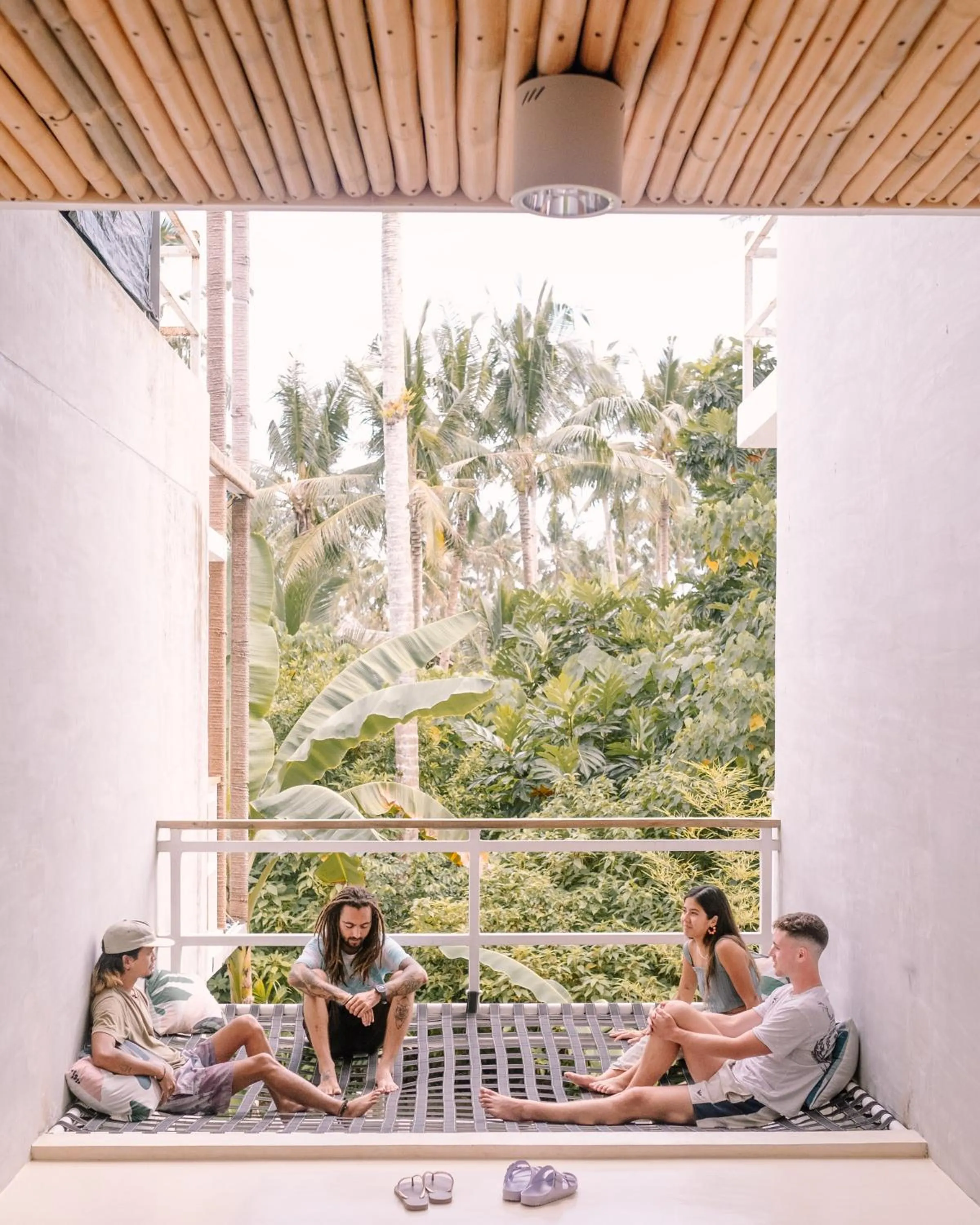 Communal lounge/ TV room in Happiness Hostel Siargao