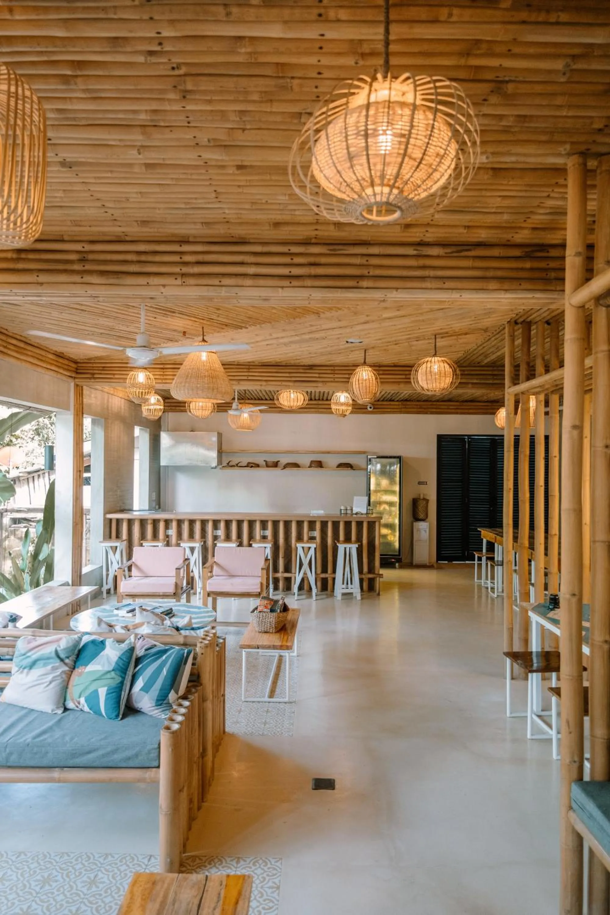 Communal lounge/ TV room in Happiness Hostel Siargao