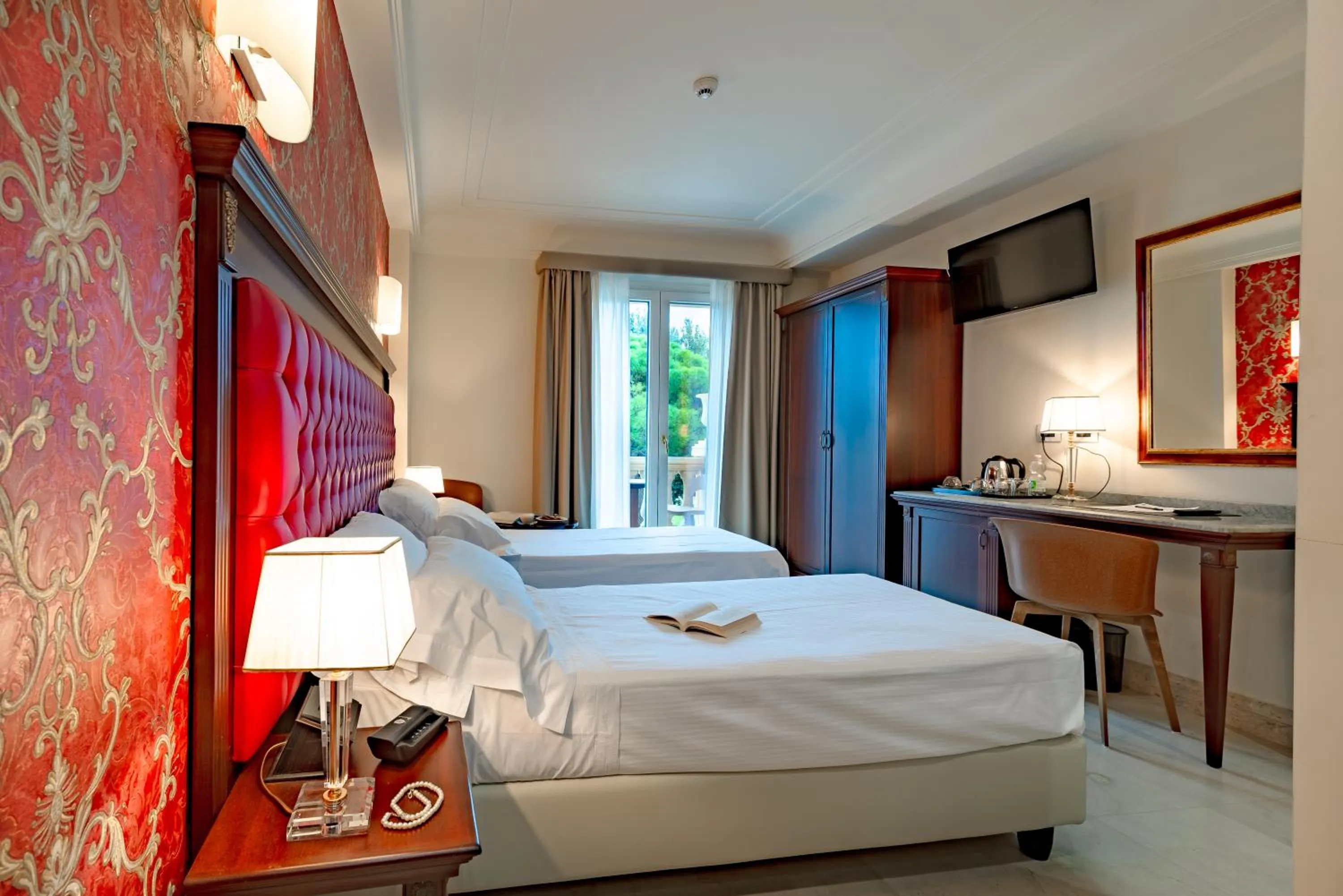 Bed in La Paloma Blanca Hotel