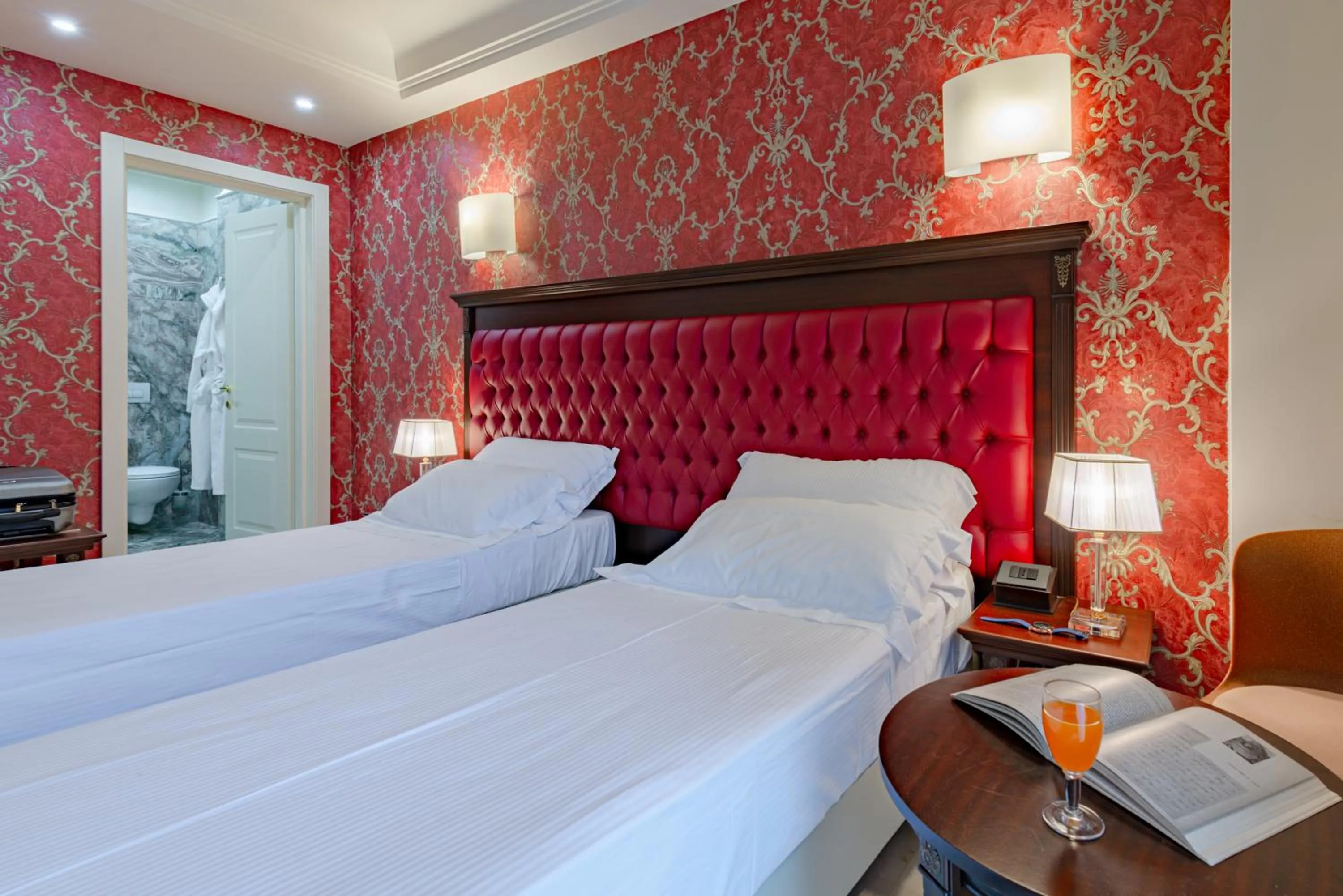 Bed in La Paloma Blanca Hotel