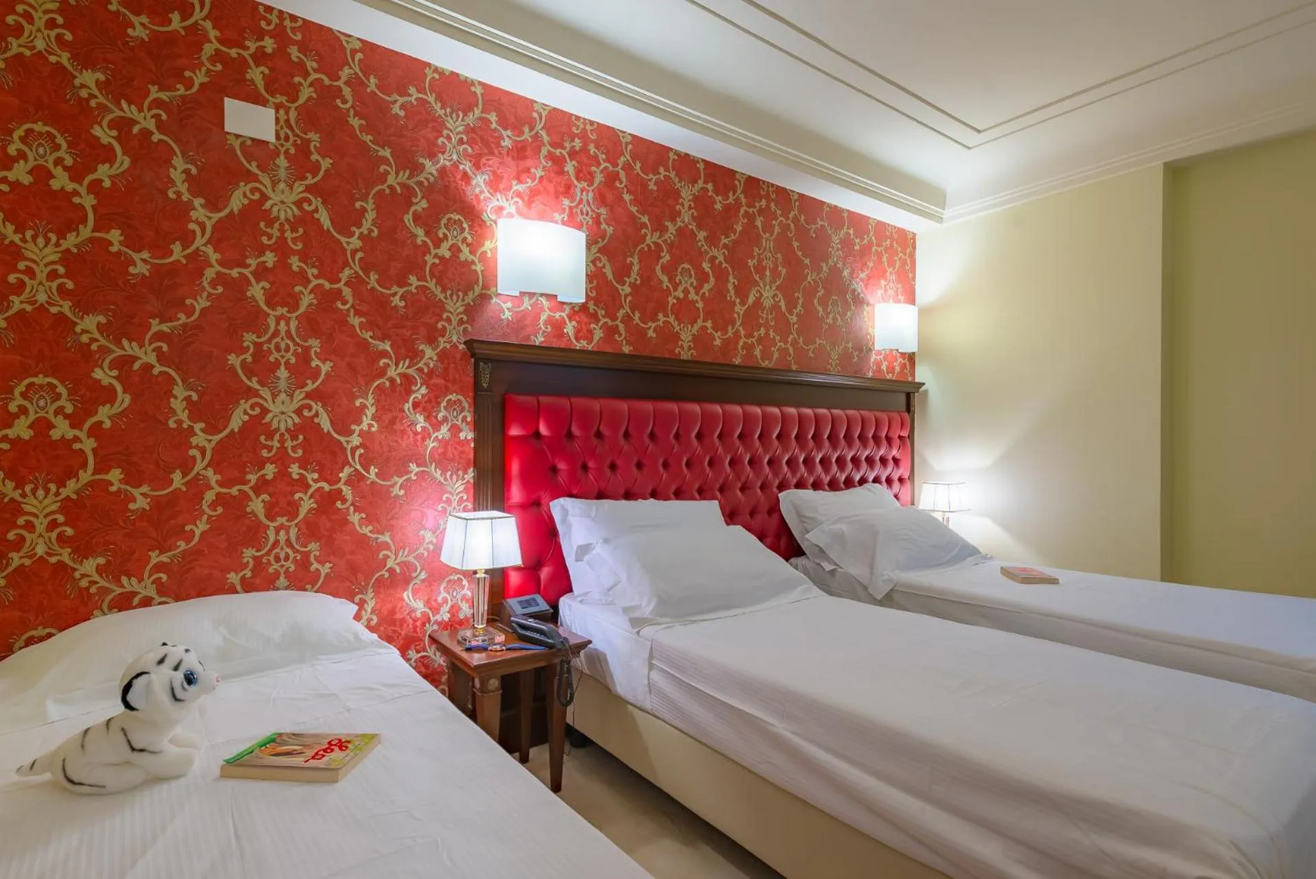 Bed in La Paloma Blanca Hotel