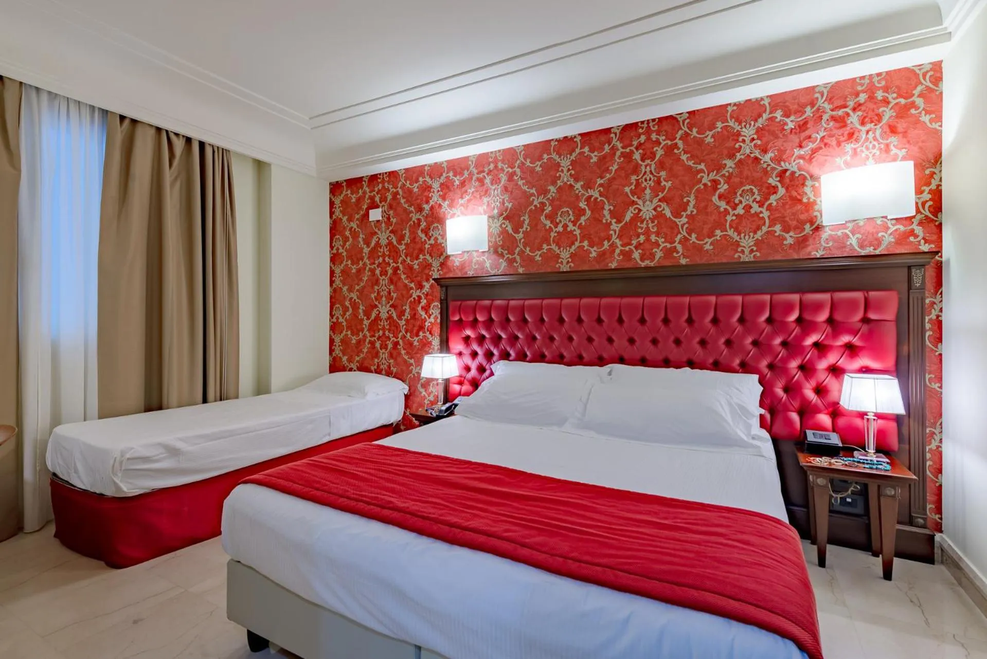 Bed in La Paloma Blanca Hotel