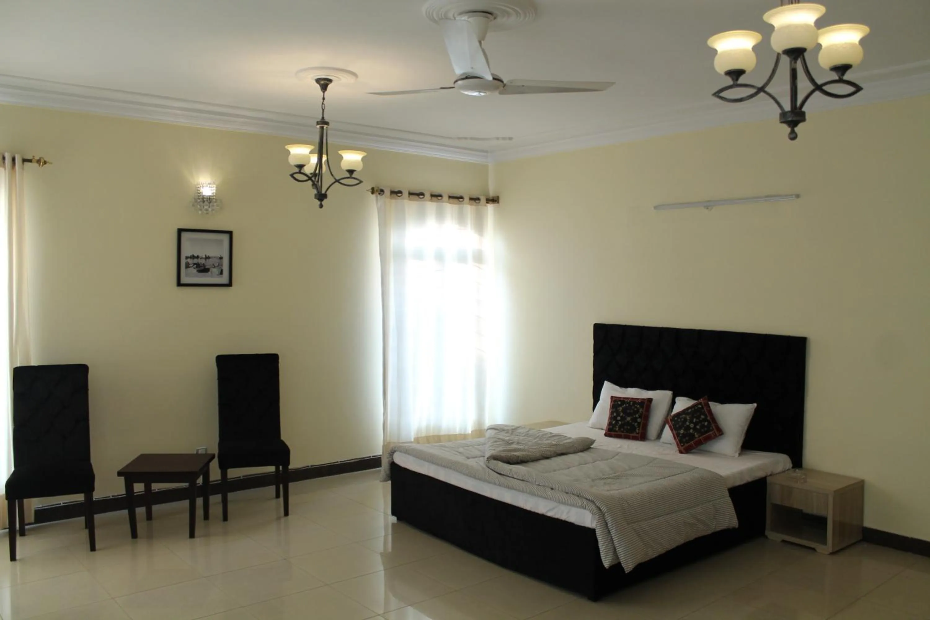 Bed in MUDAN Residency