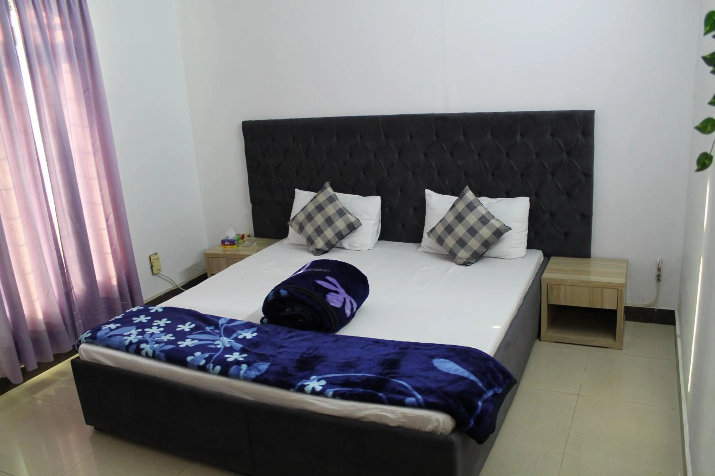 Bed in MUDAN Residency