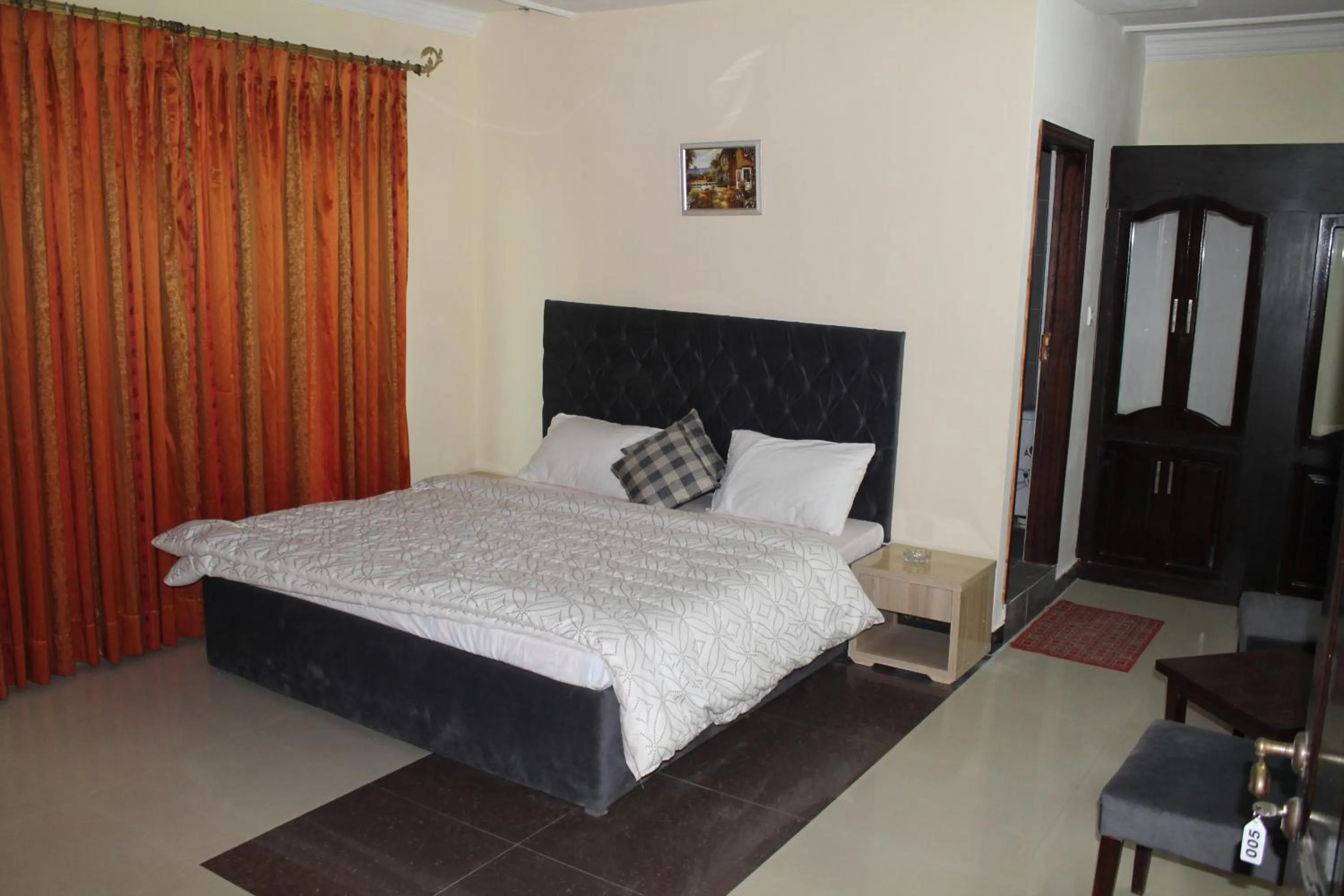 Bed in MUDAN Residency