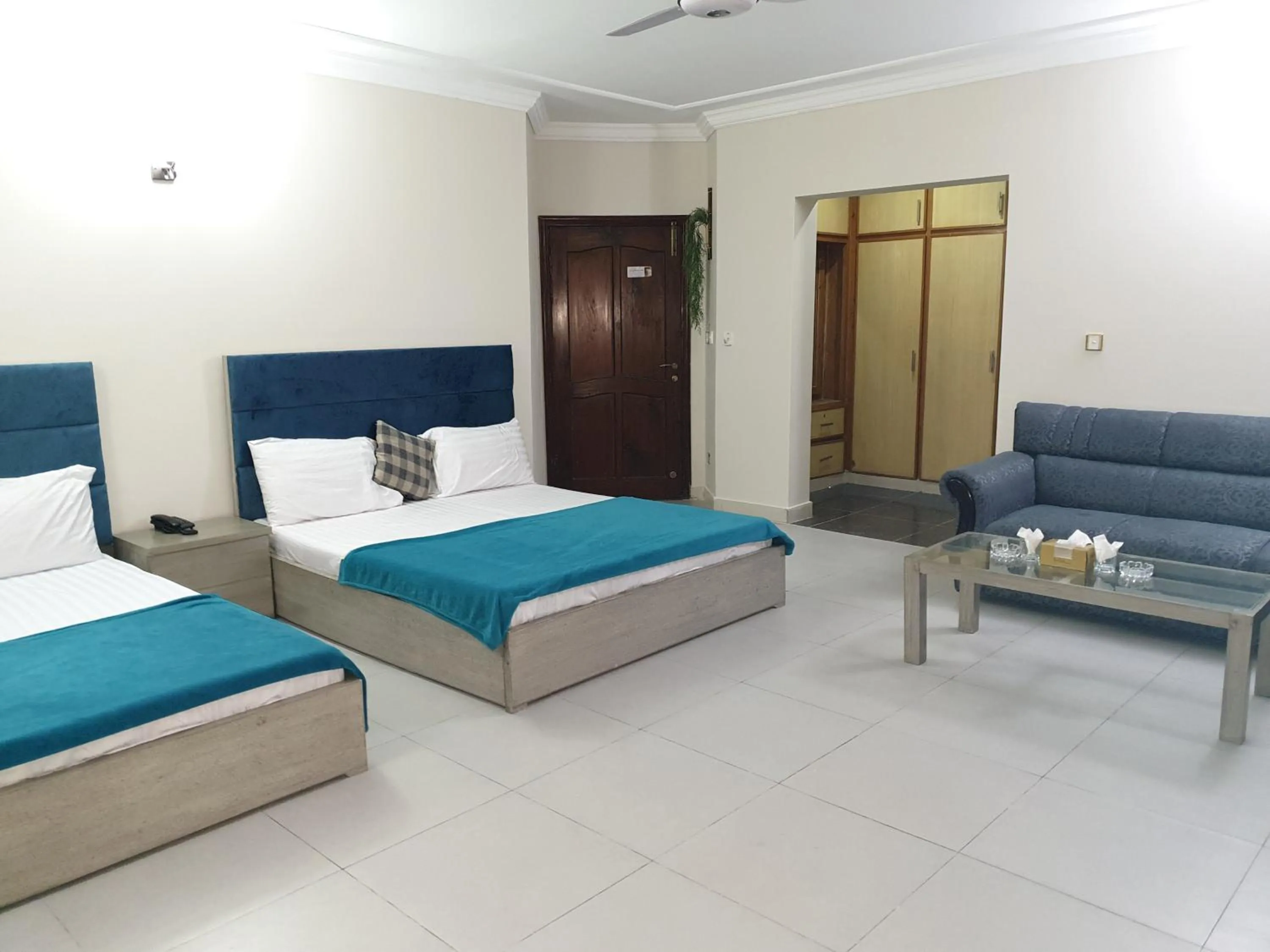 Bed in MUDAN Residency