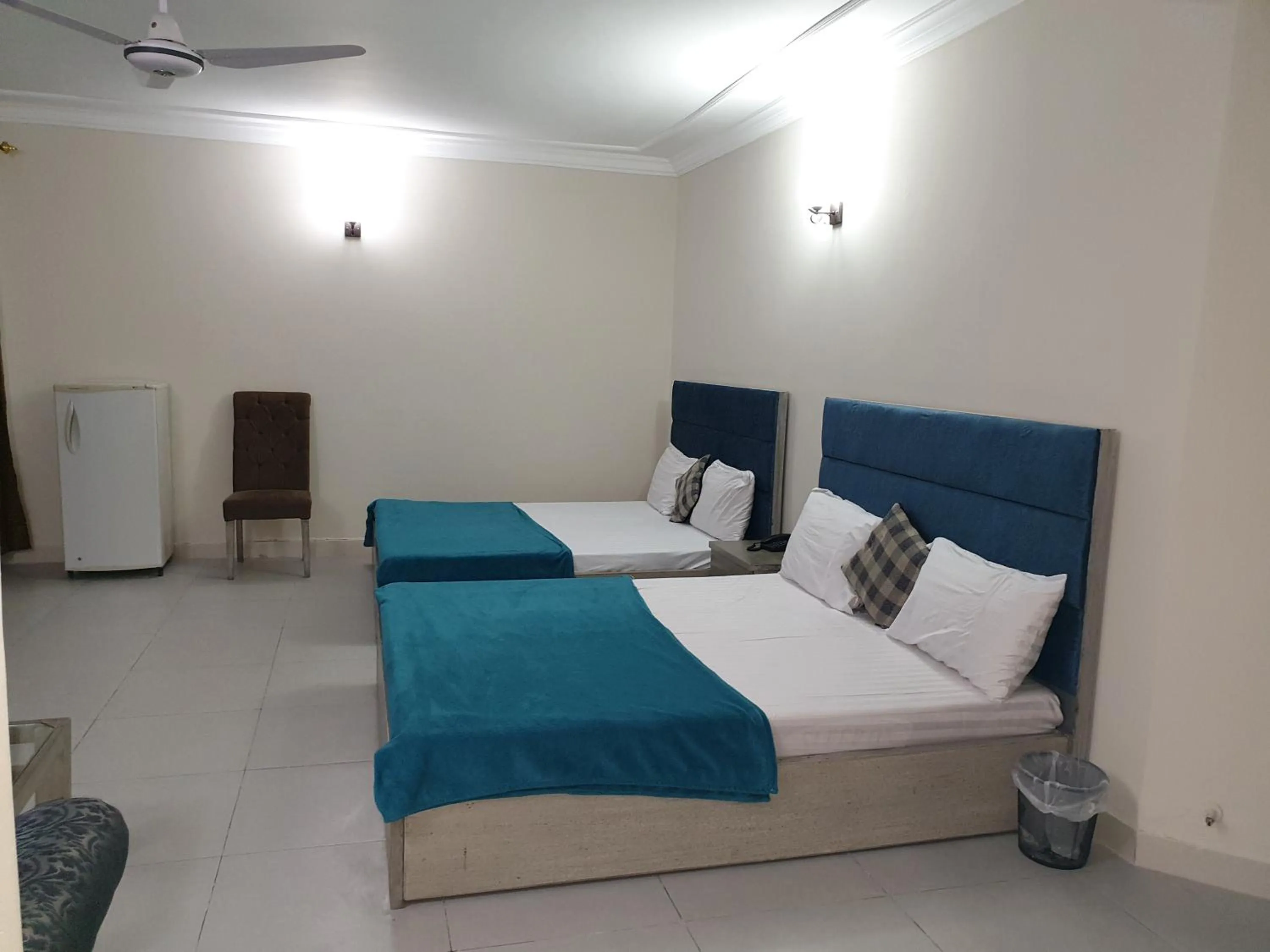 Bed in MUDAN Residency