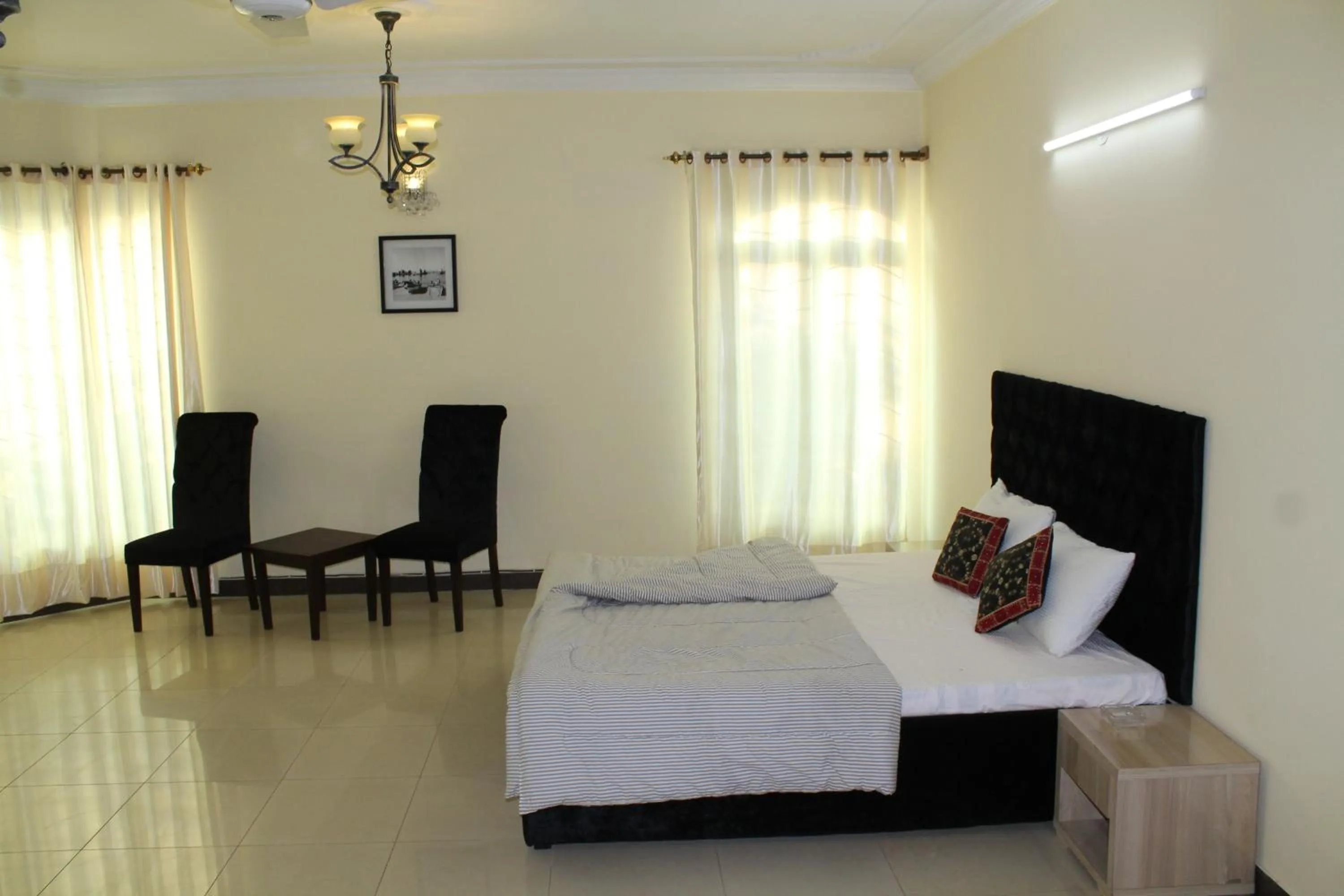 Bed in MUDAN Residency