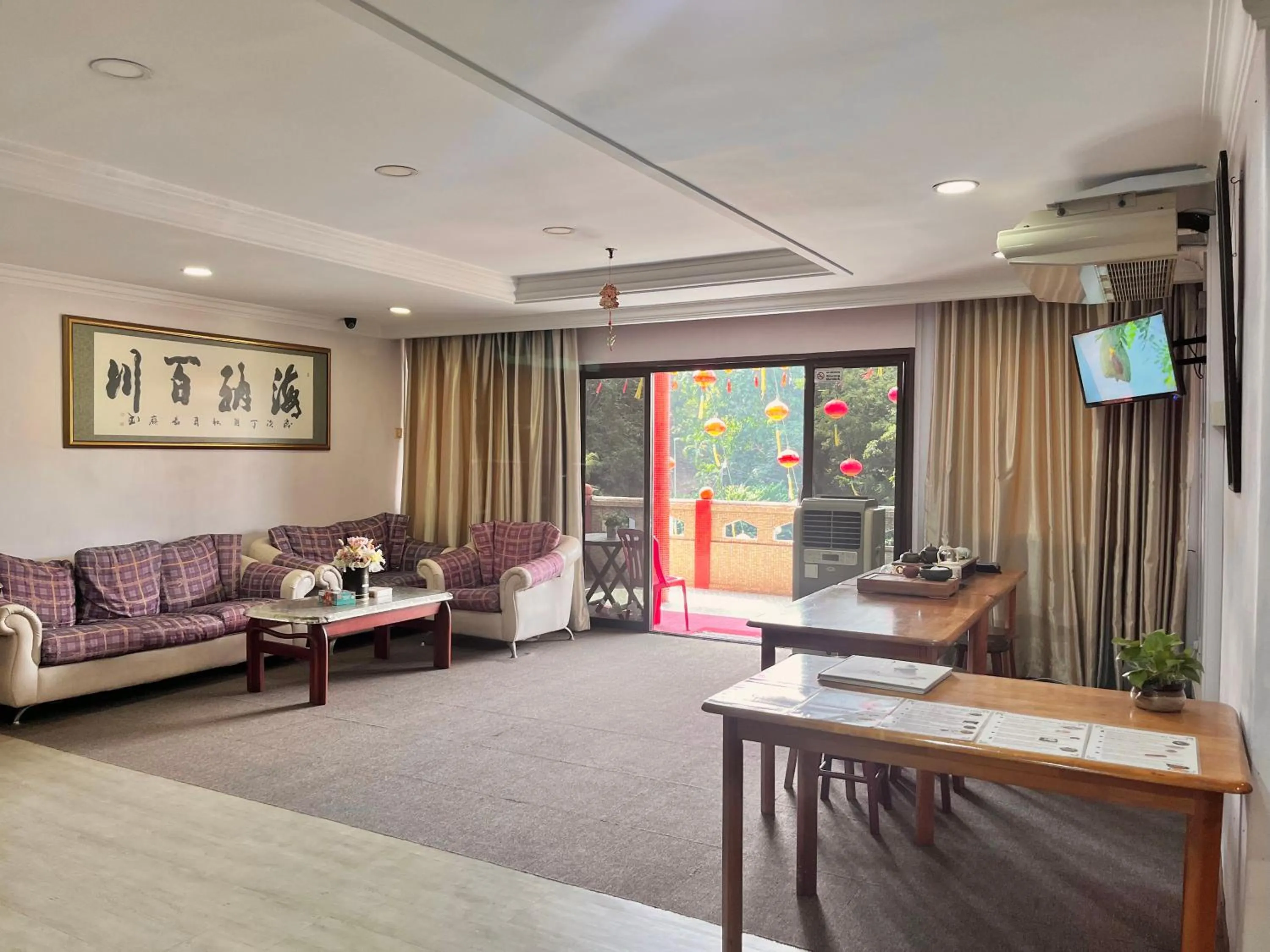 Communal lounge/ TV room in Heng Ann Guest House