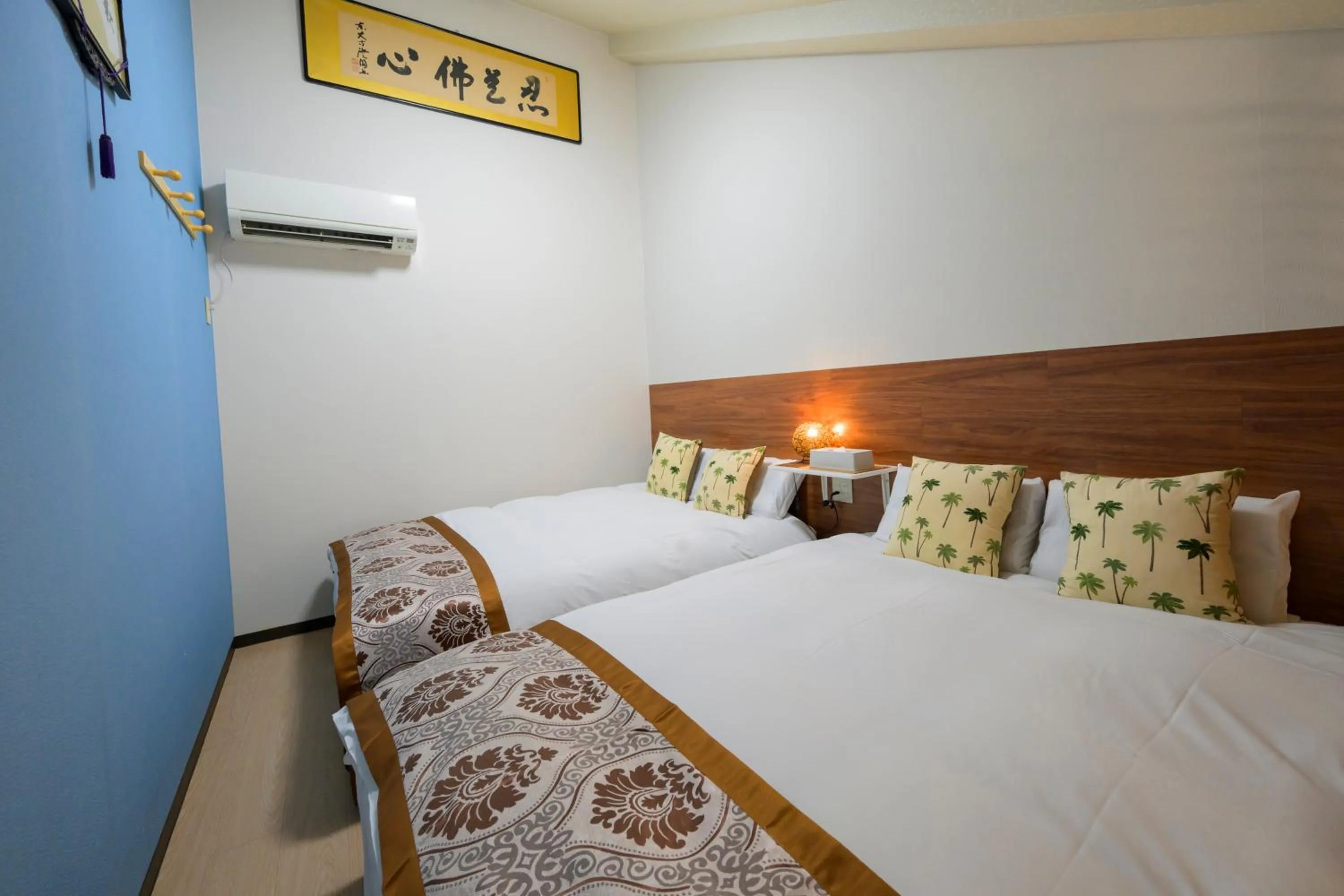 Bed in HOTEL AARON通天東
