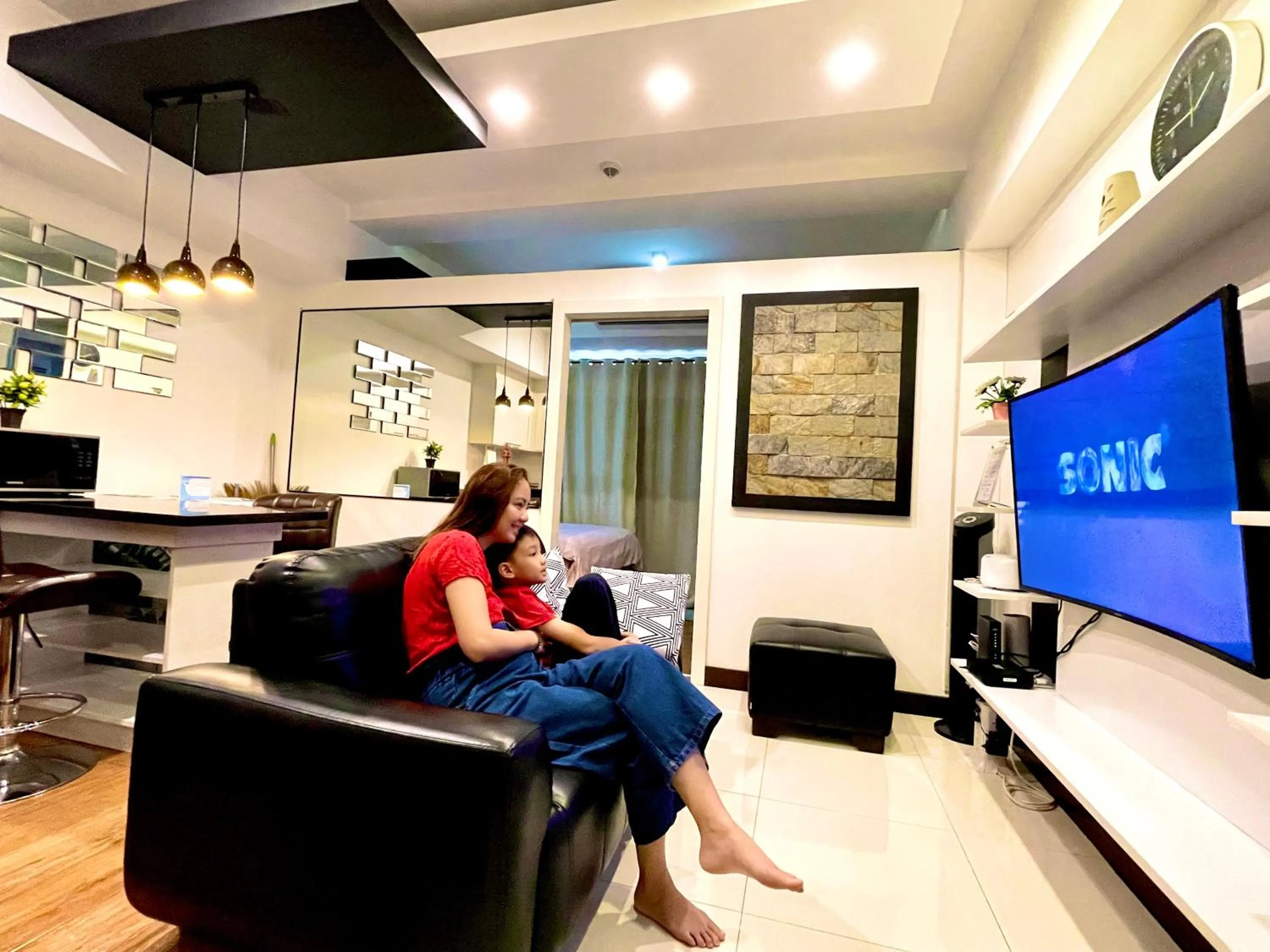 TV and multimedia in Luxury 1BR Unit with Pool at Venice Luxury Residences, Tower Domenico, McKinley Hill, Taguig City