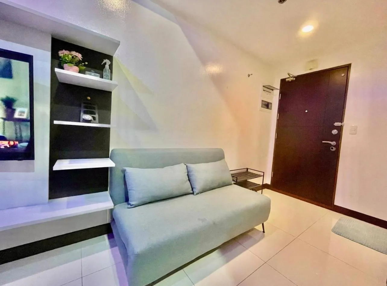Living room in Luxury 1BR Unit with Pool at Venice Luxury Residences, Tower Domenico, McKinley Hill, Taguig City