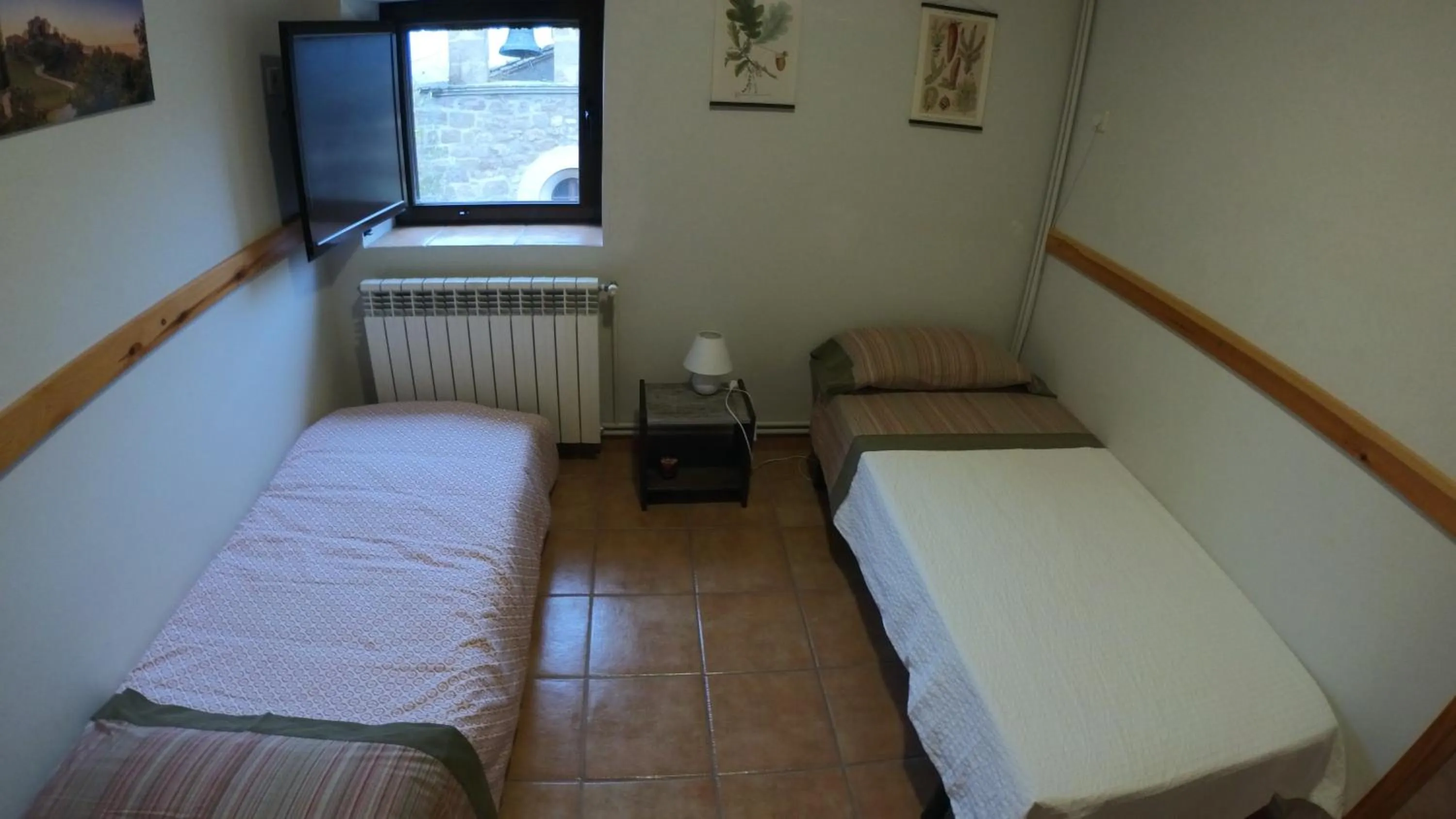 Photo of the whole room, Bed in Castell de Ceuró. Hotel Rural