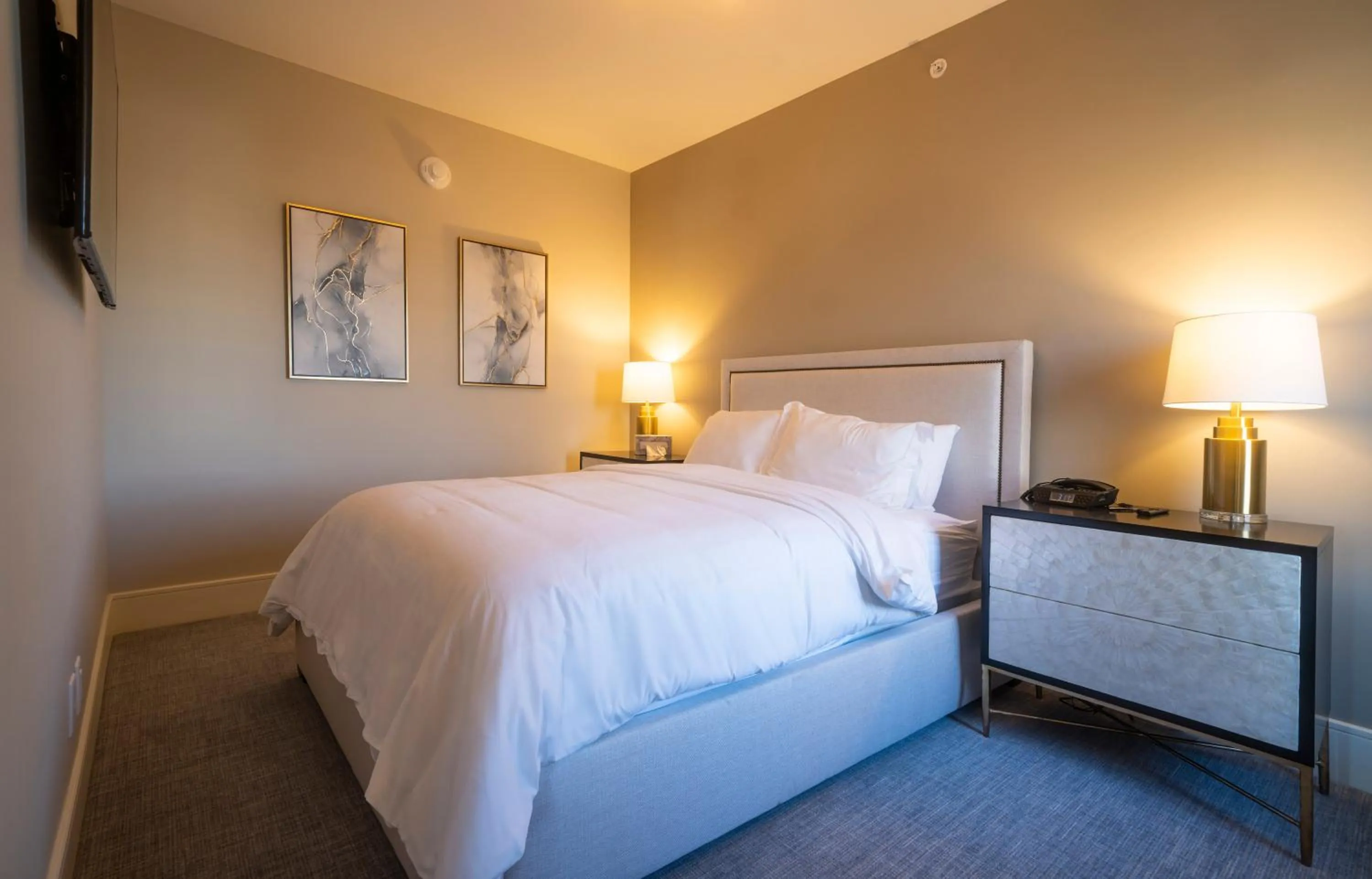 Bed in Orange Inn Boutique Hotel