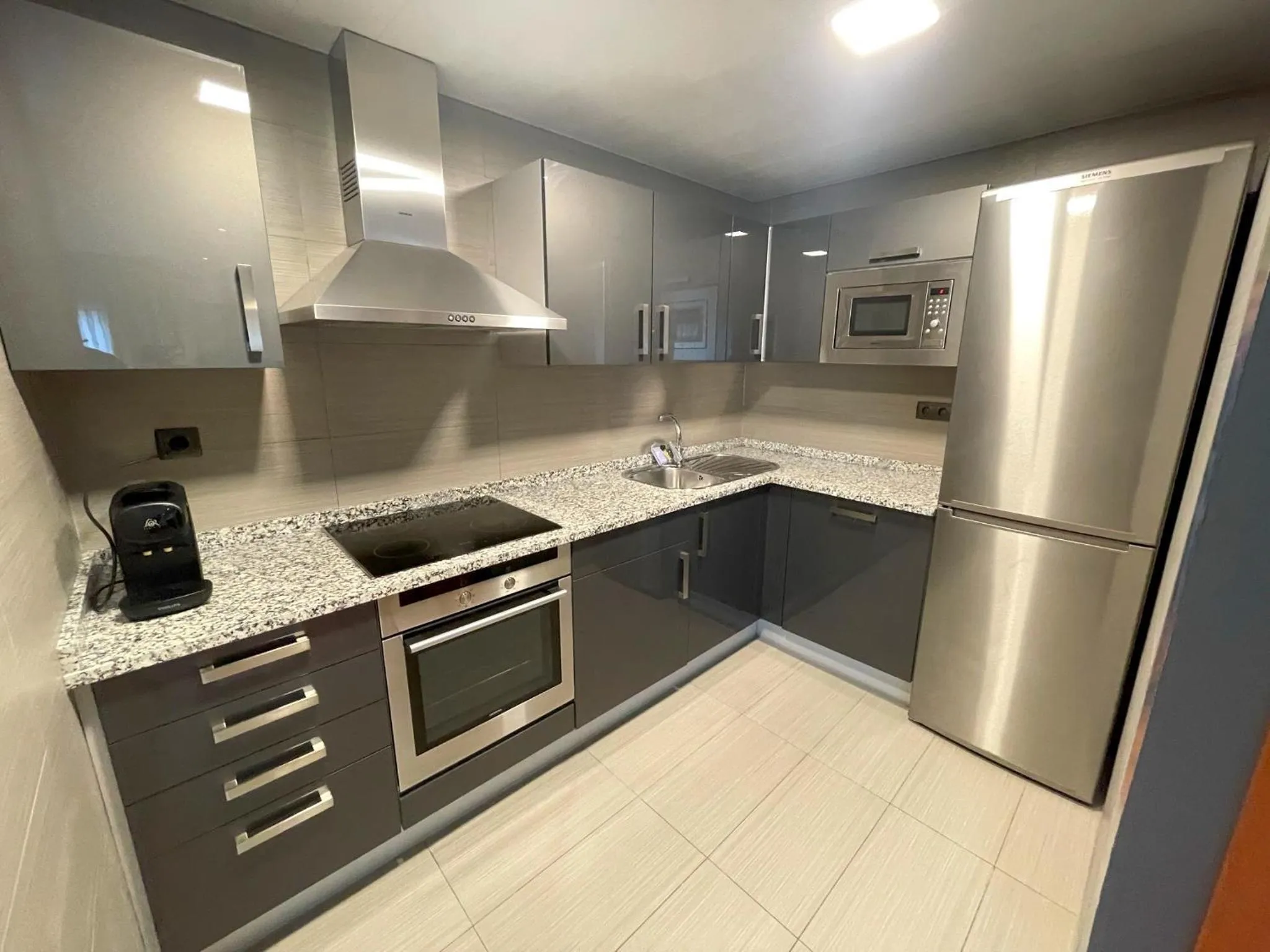 Kitchen or kitchenette in Hotel Apartamentos San Fermín Pamplona