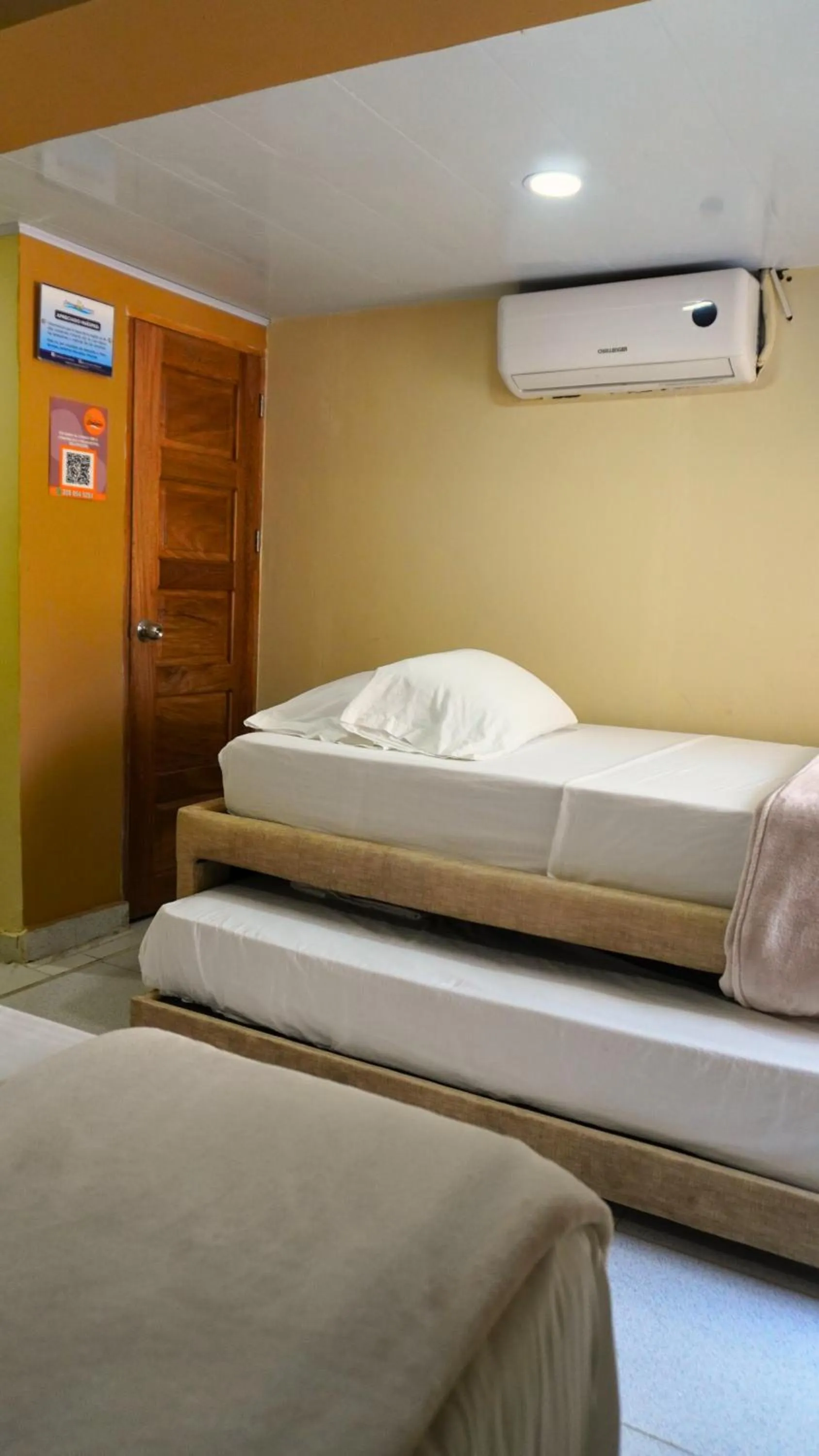 Bed in Hotel y Cabañas Covemar