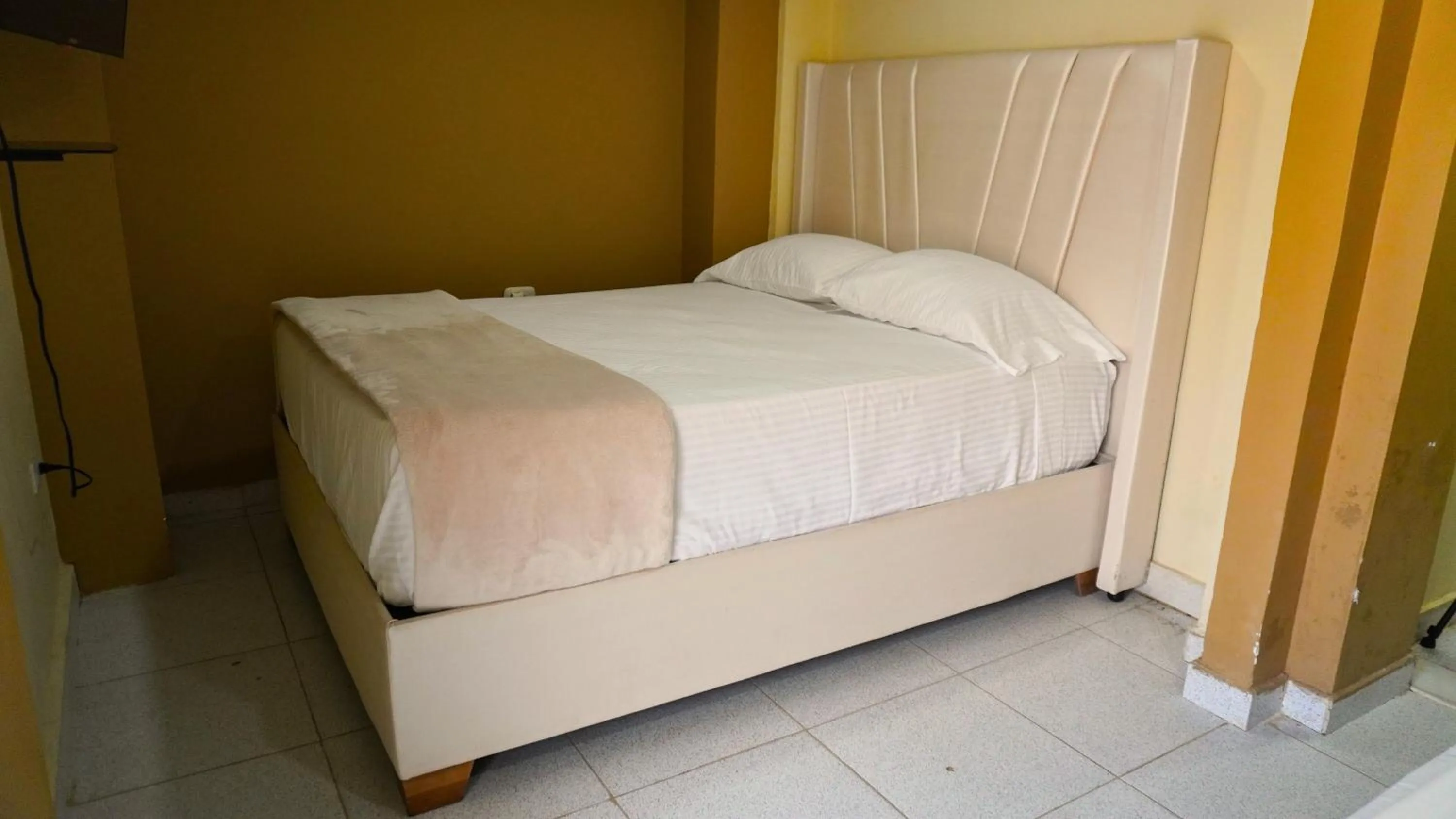 Bed in Hotel y Cabañas Covemar