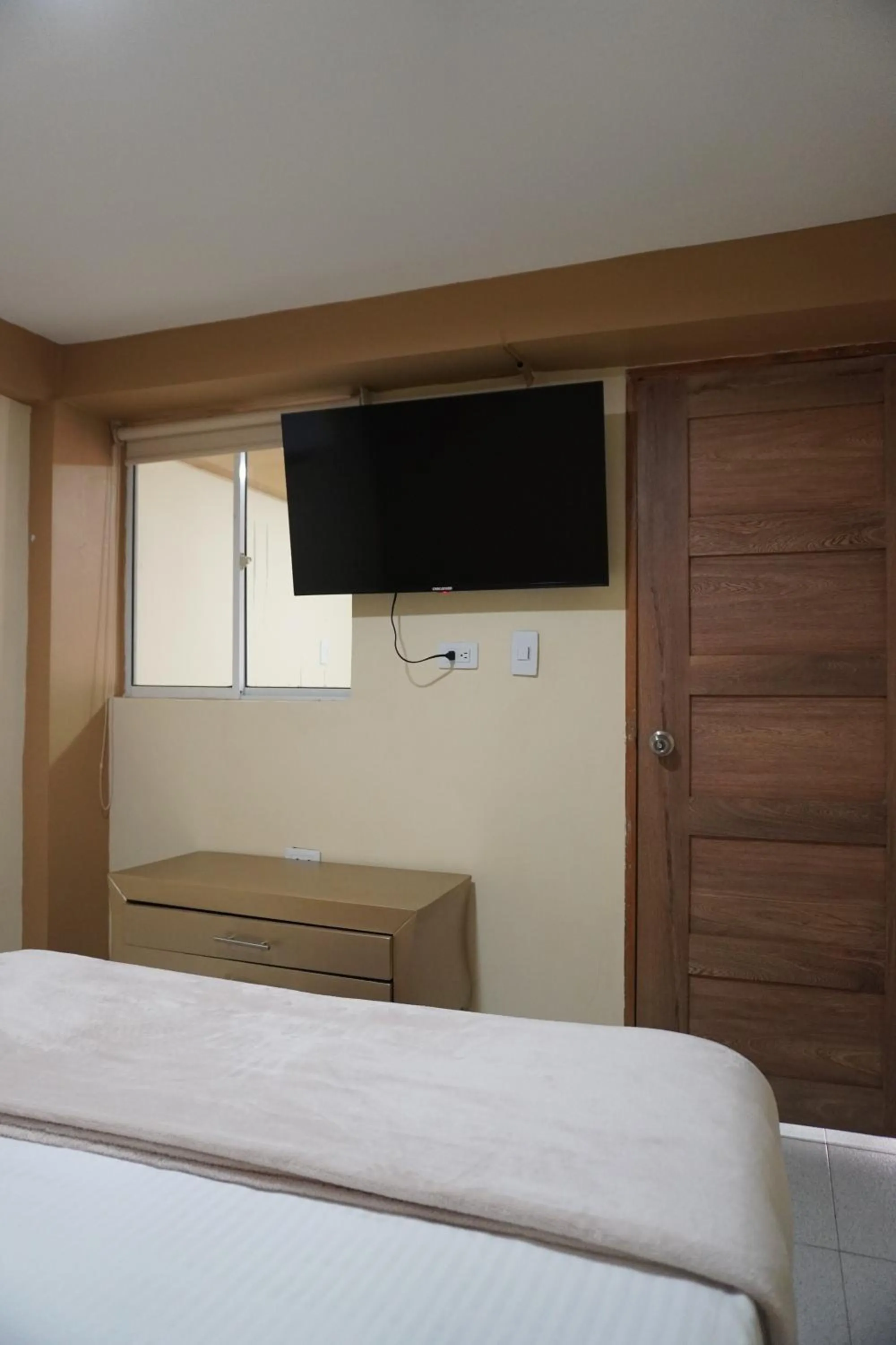 Bed in Hotel y Cabañas Covemar